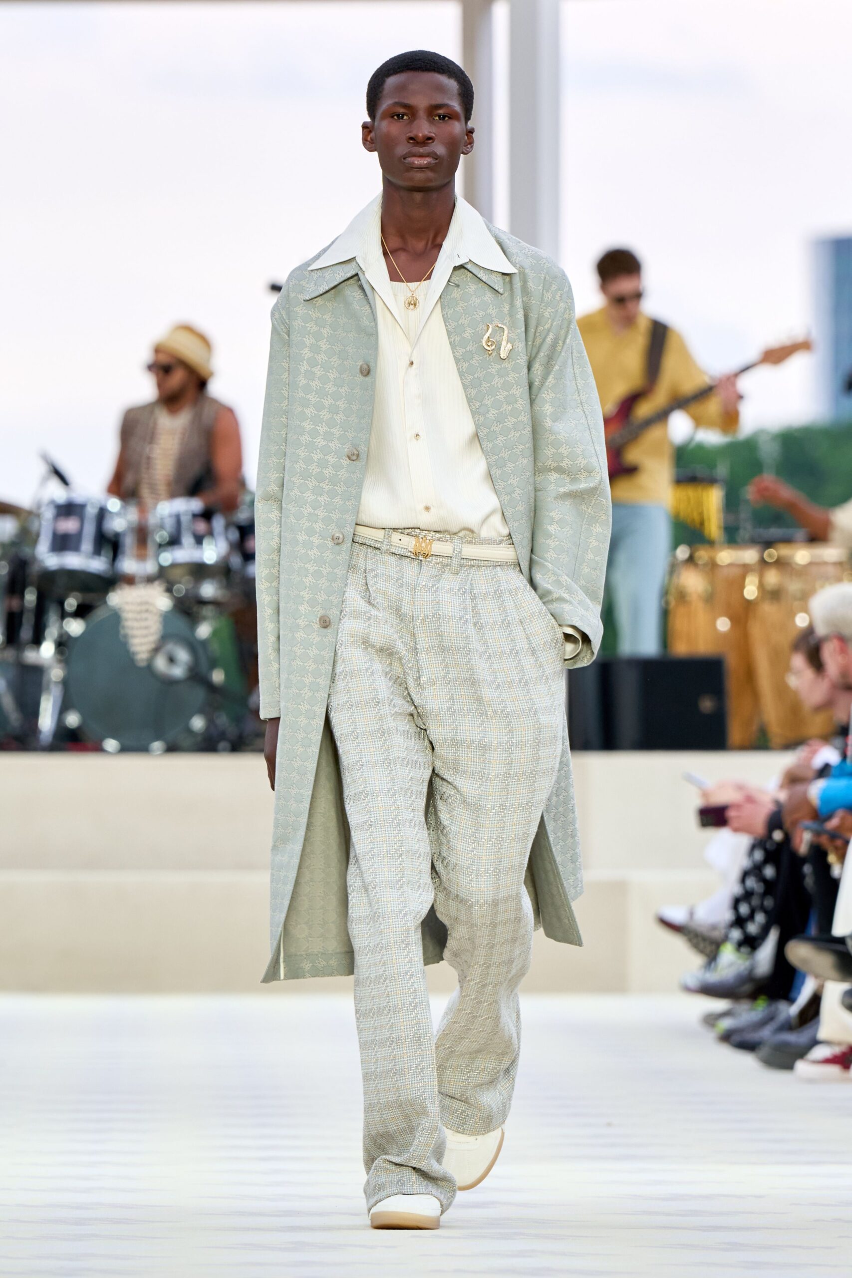 light blue coat and white shirt