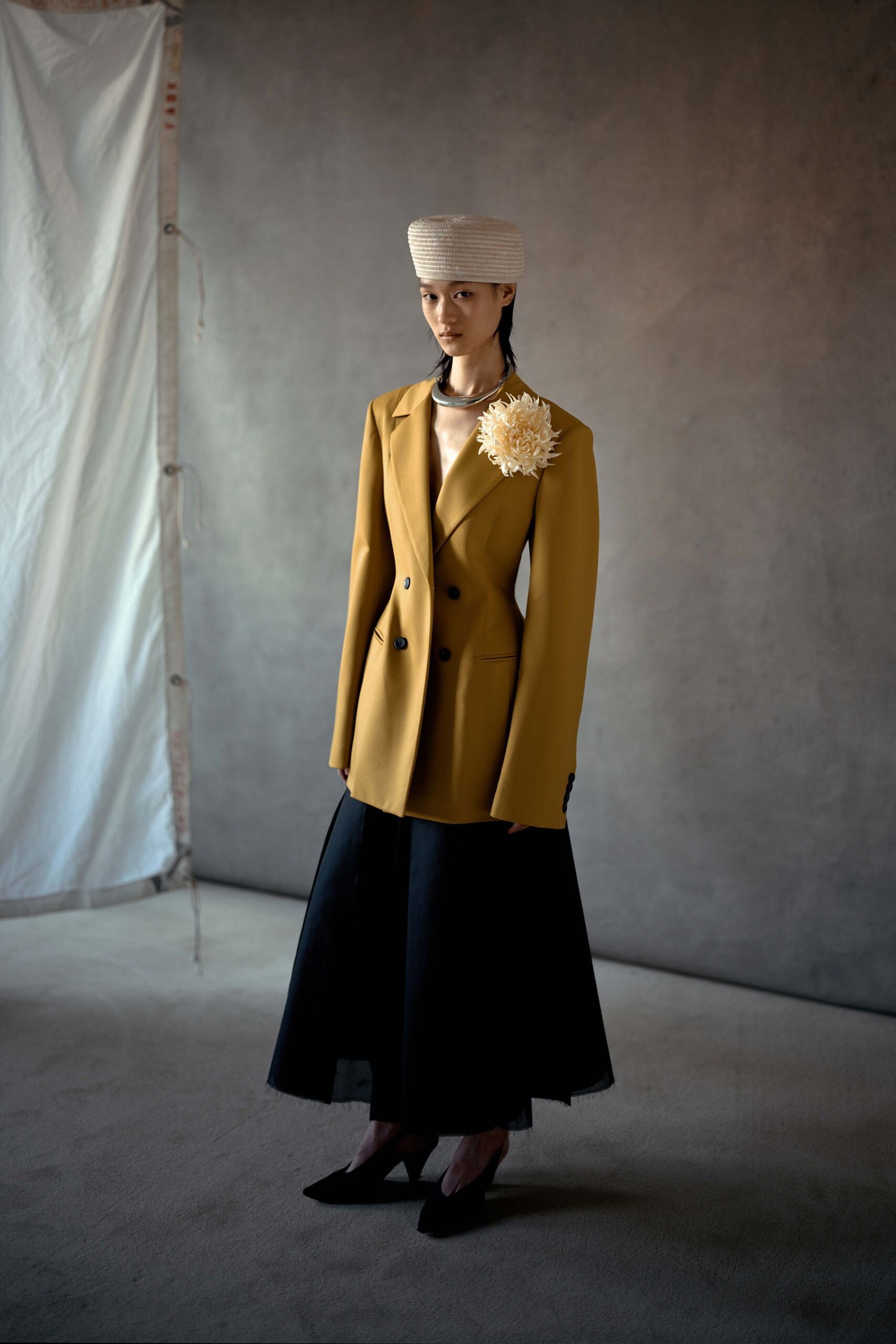 yellow blazer black skirt outfit