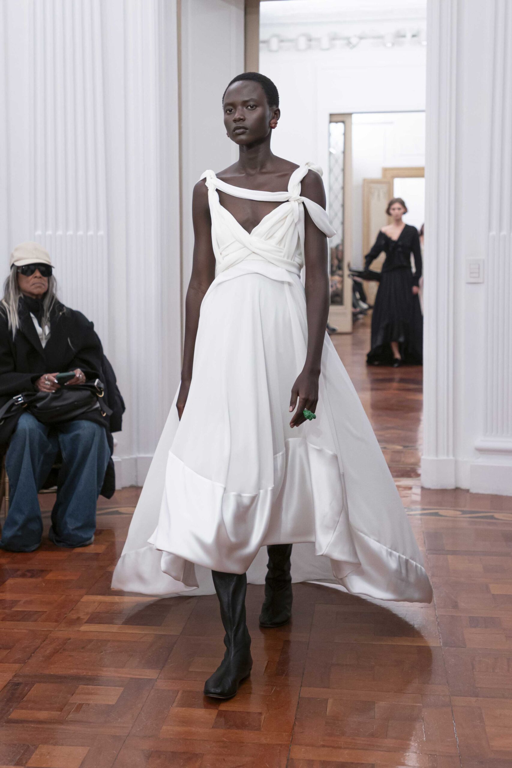 white draped midi dress with black boots