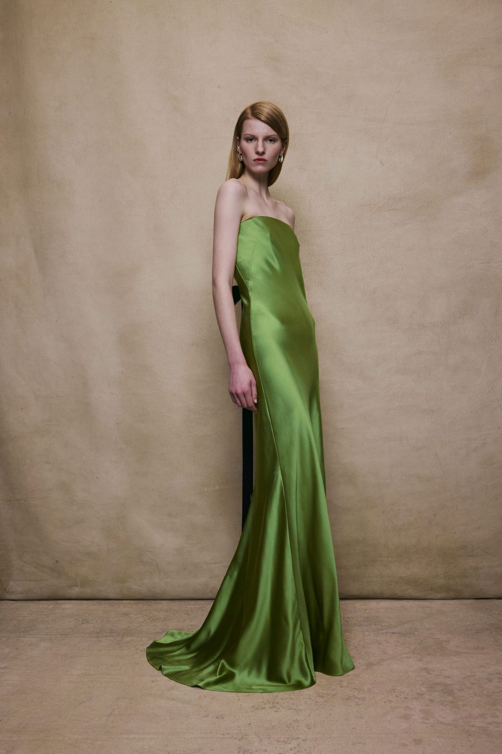 green silk strapless gown