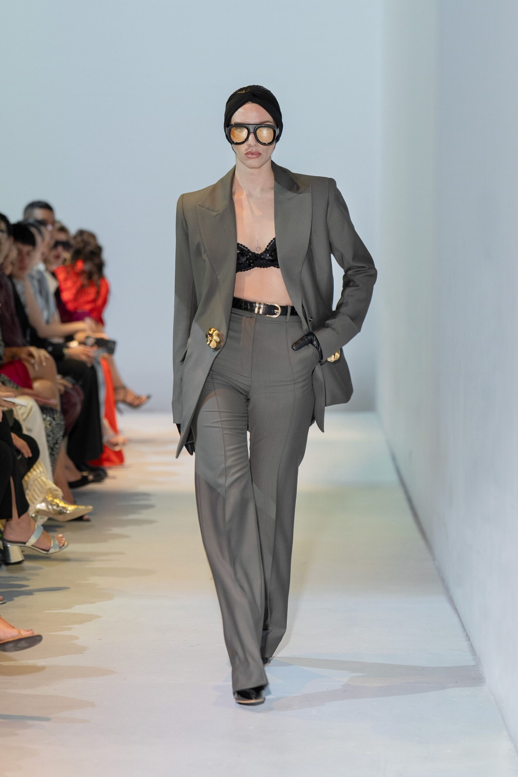 gray tailored blazer with black bra