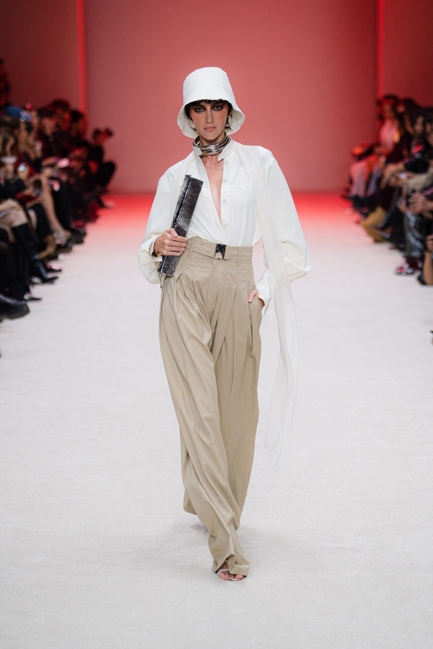 white shirt beige pants