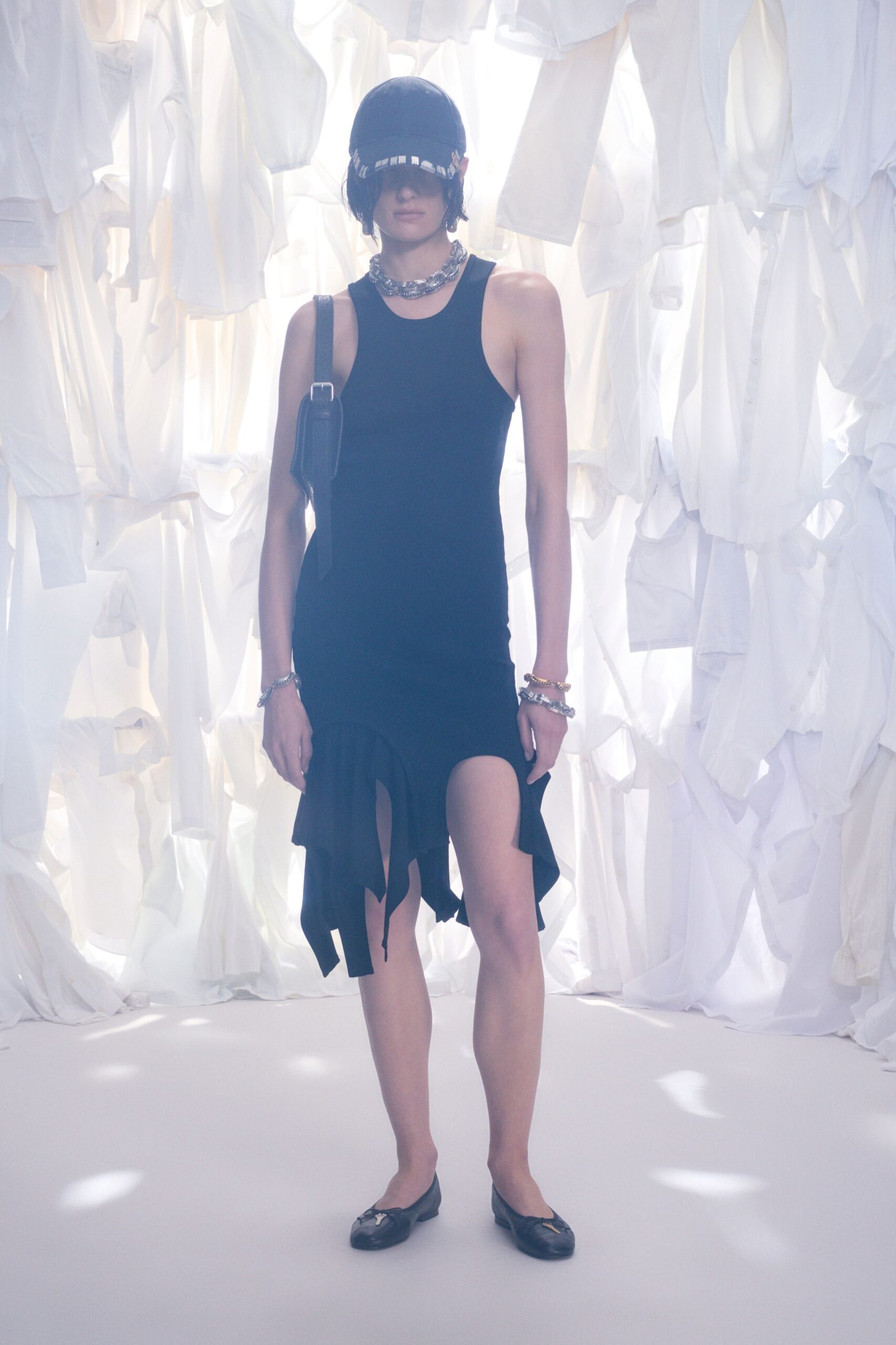 black cotton sleeveless high-neck fitted ruffled mini dress