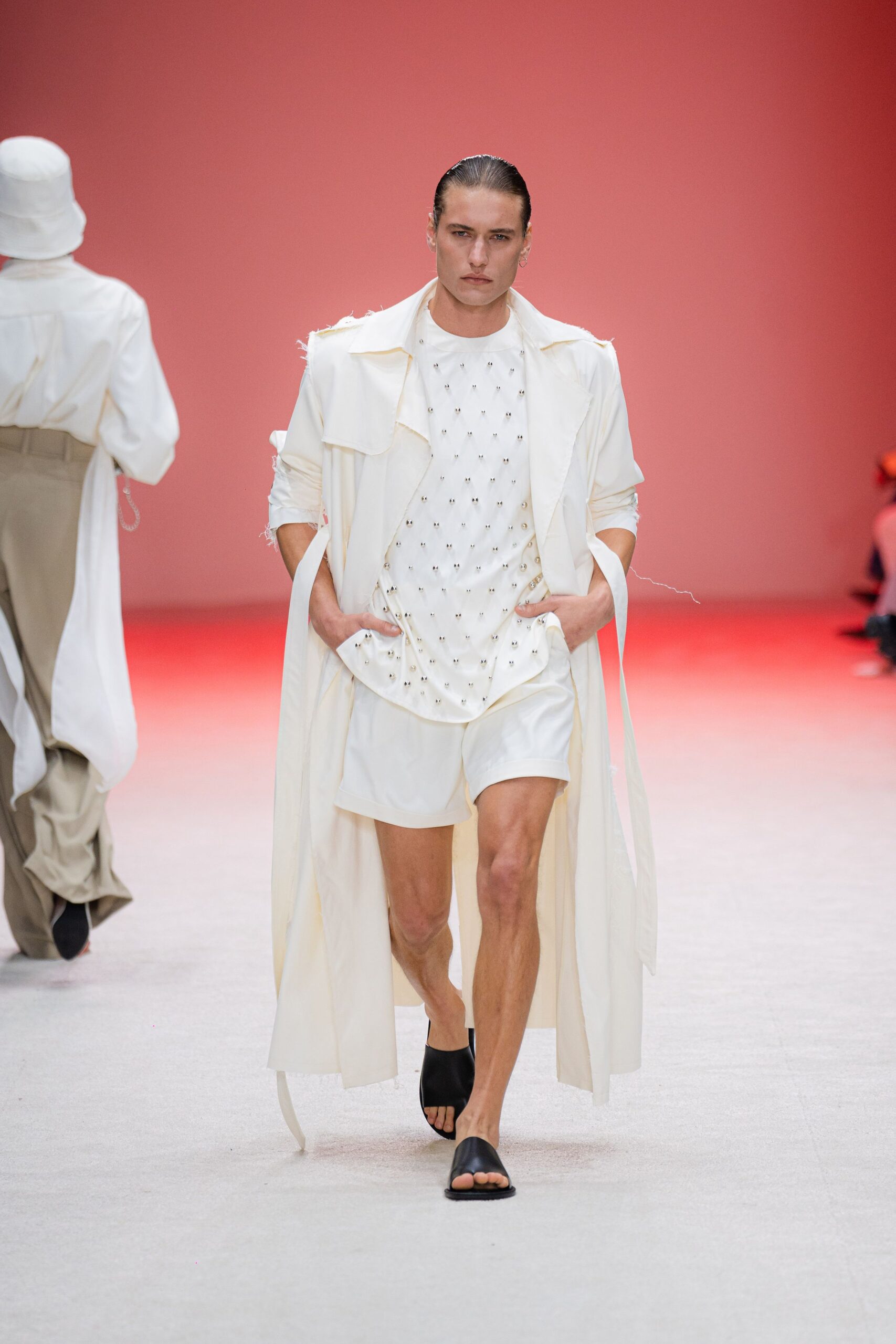 white coat with black sandals