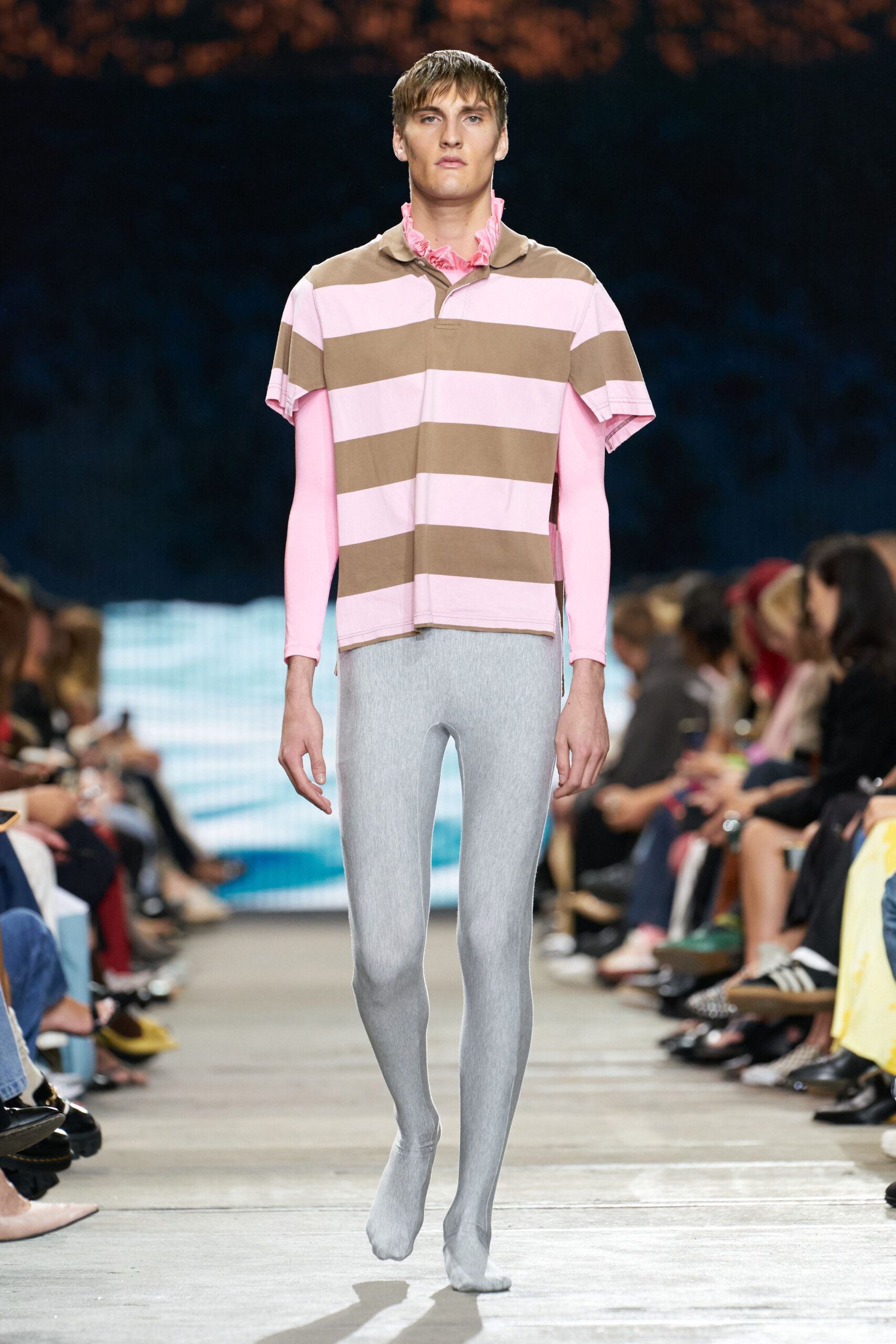 pink and brown striped top with gray leggings