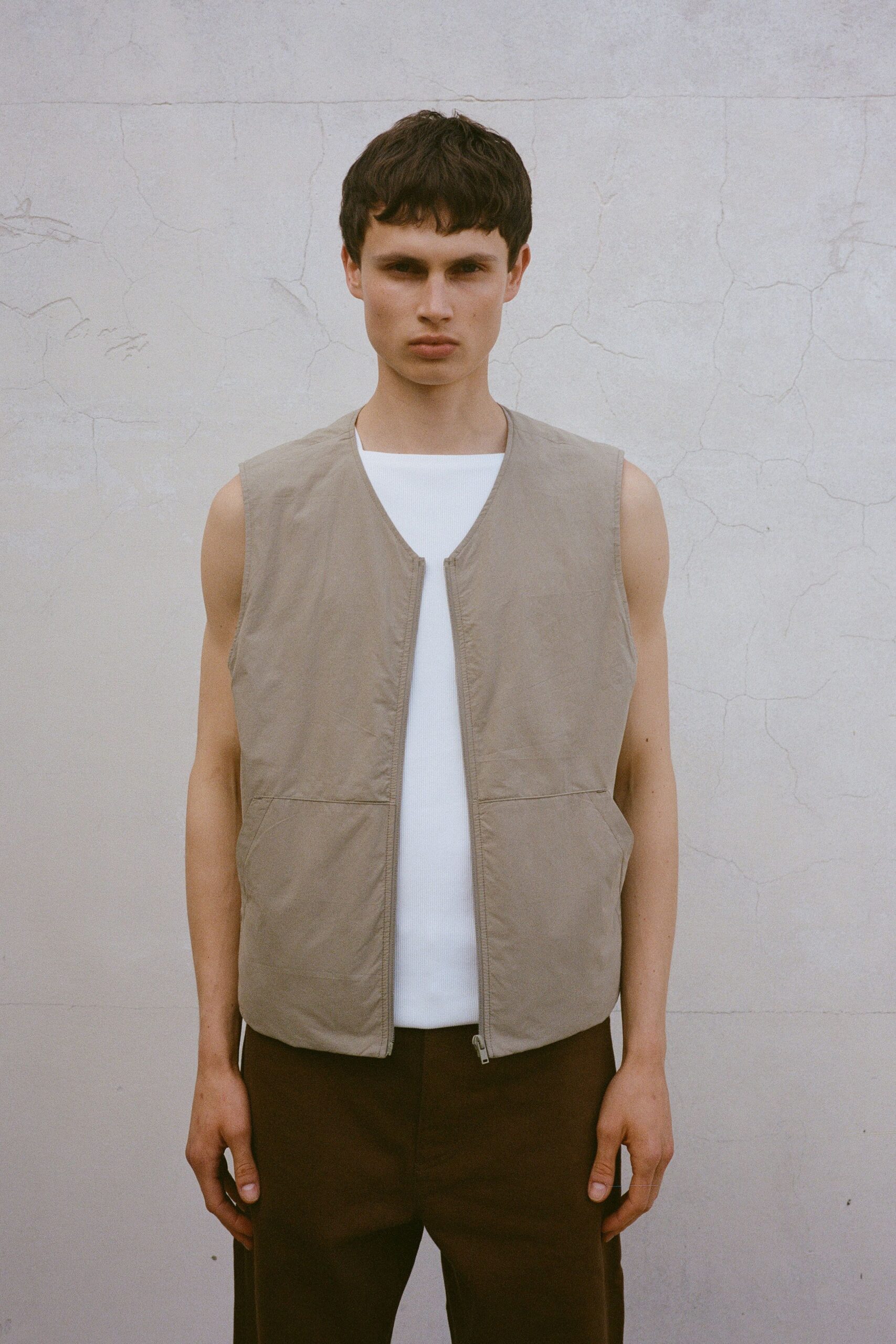 white cotton sleeveless fitted shirt