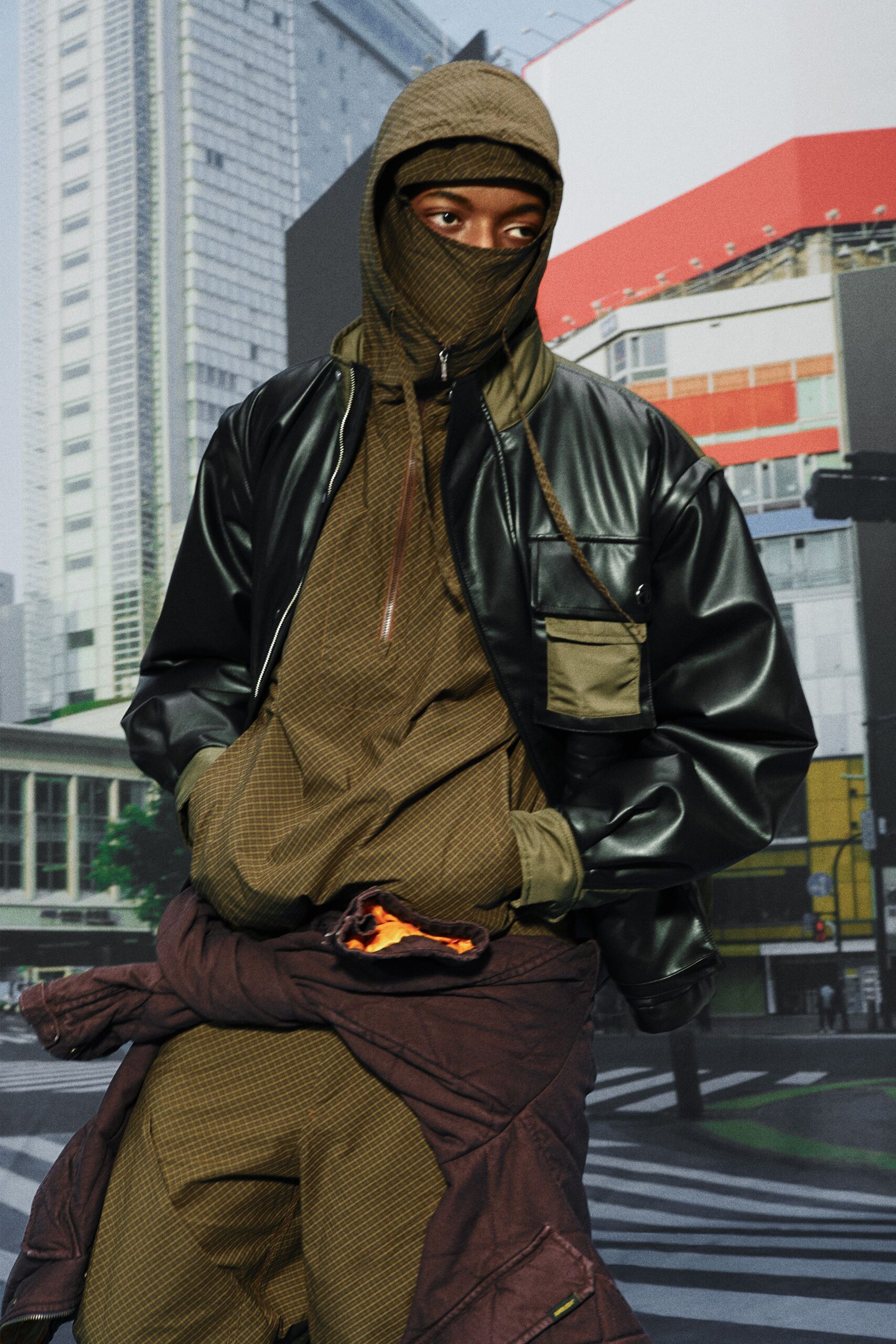black leather jacket brown top pants