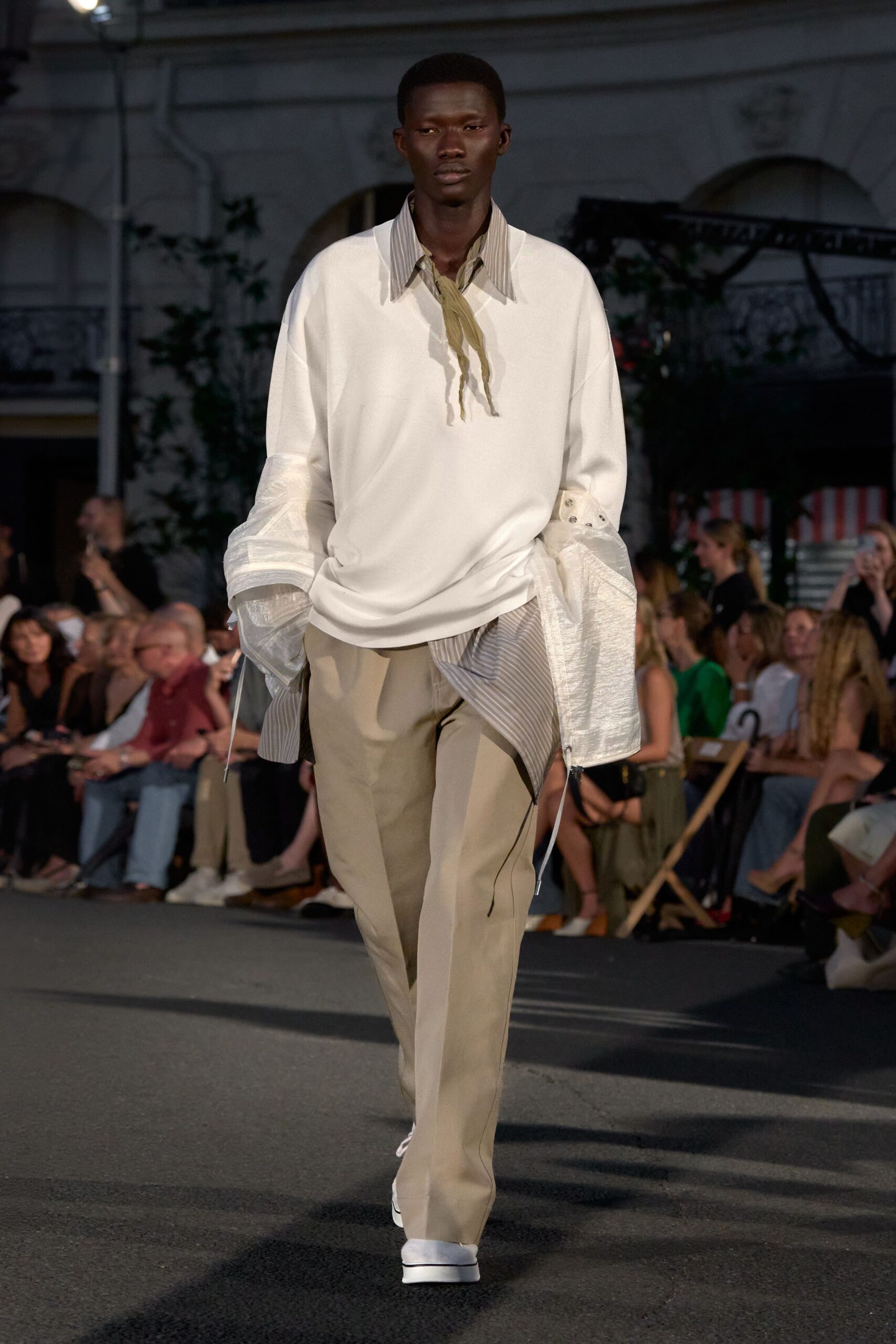 oversized layered top with beige pants