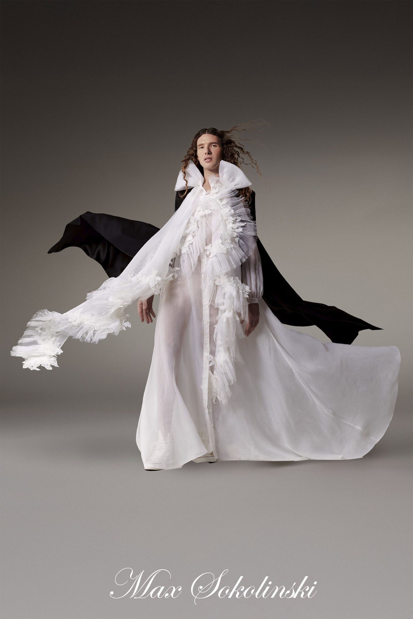 white and black flowing gown