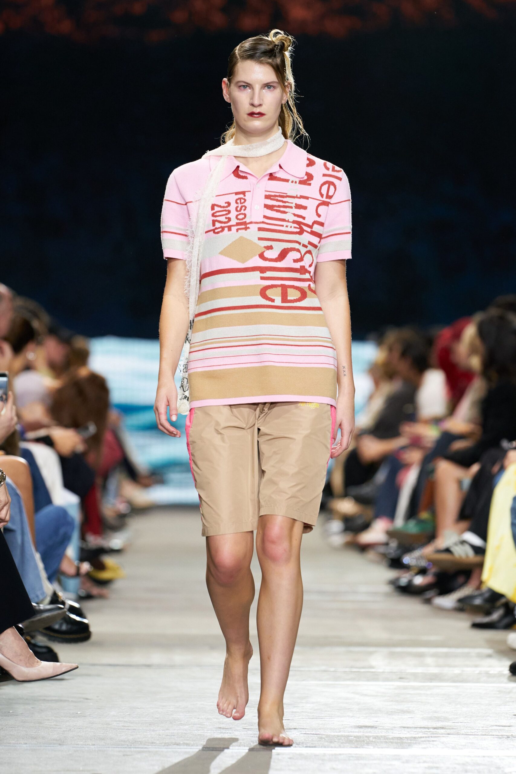 pink printed top with beige shorts