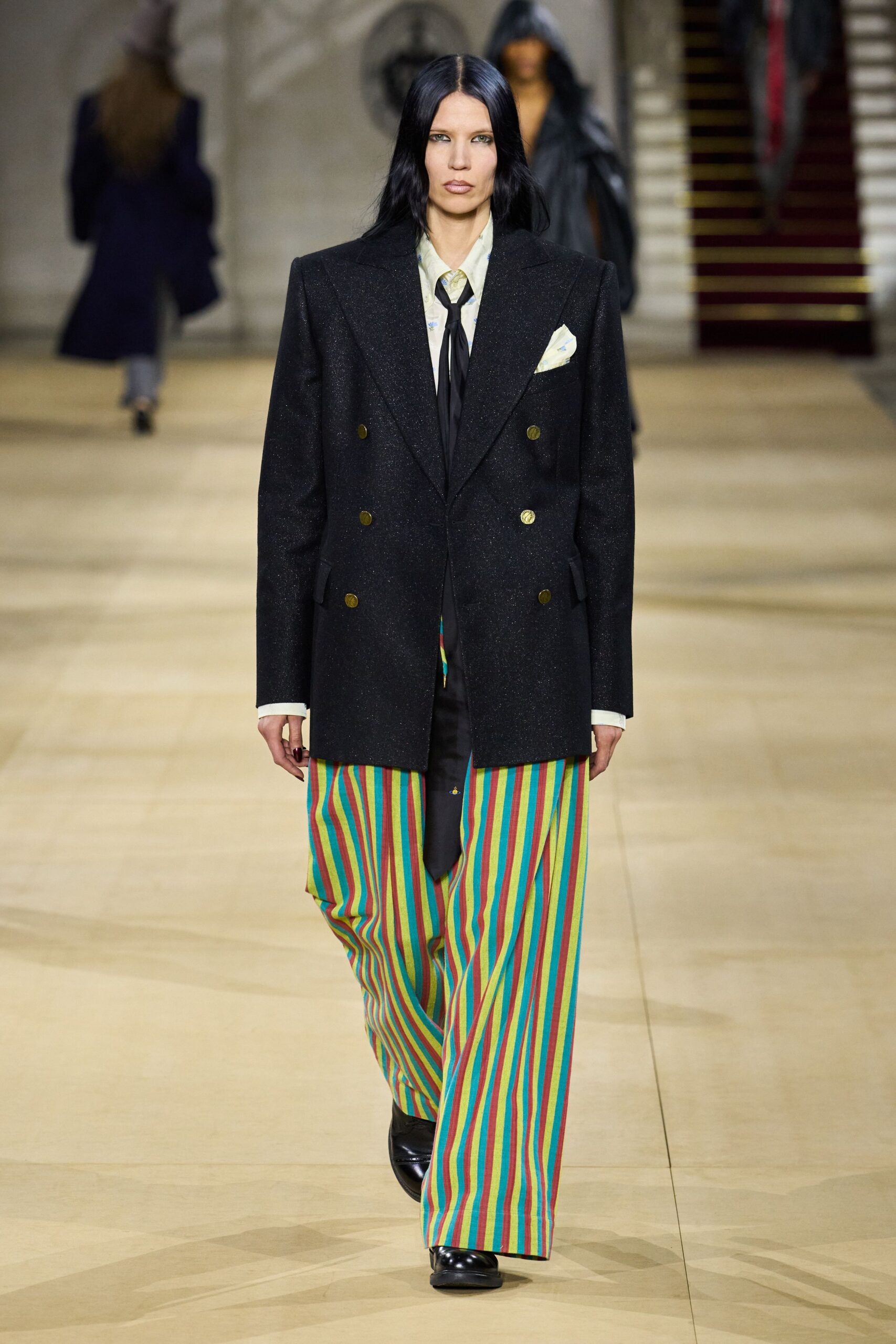 black tailored blazer with striped pants