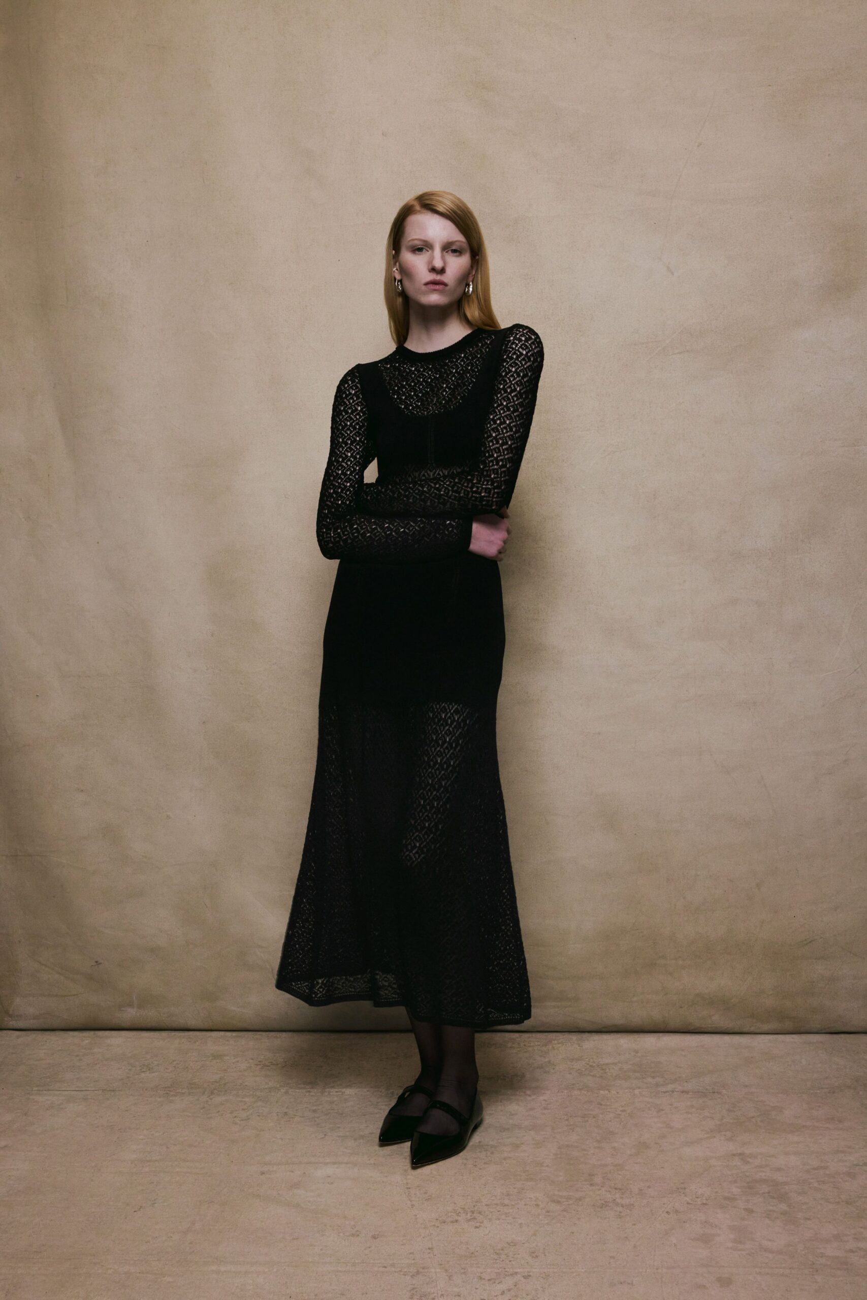 black lace midi dress with long sleeves