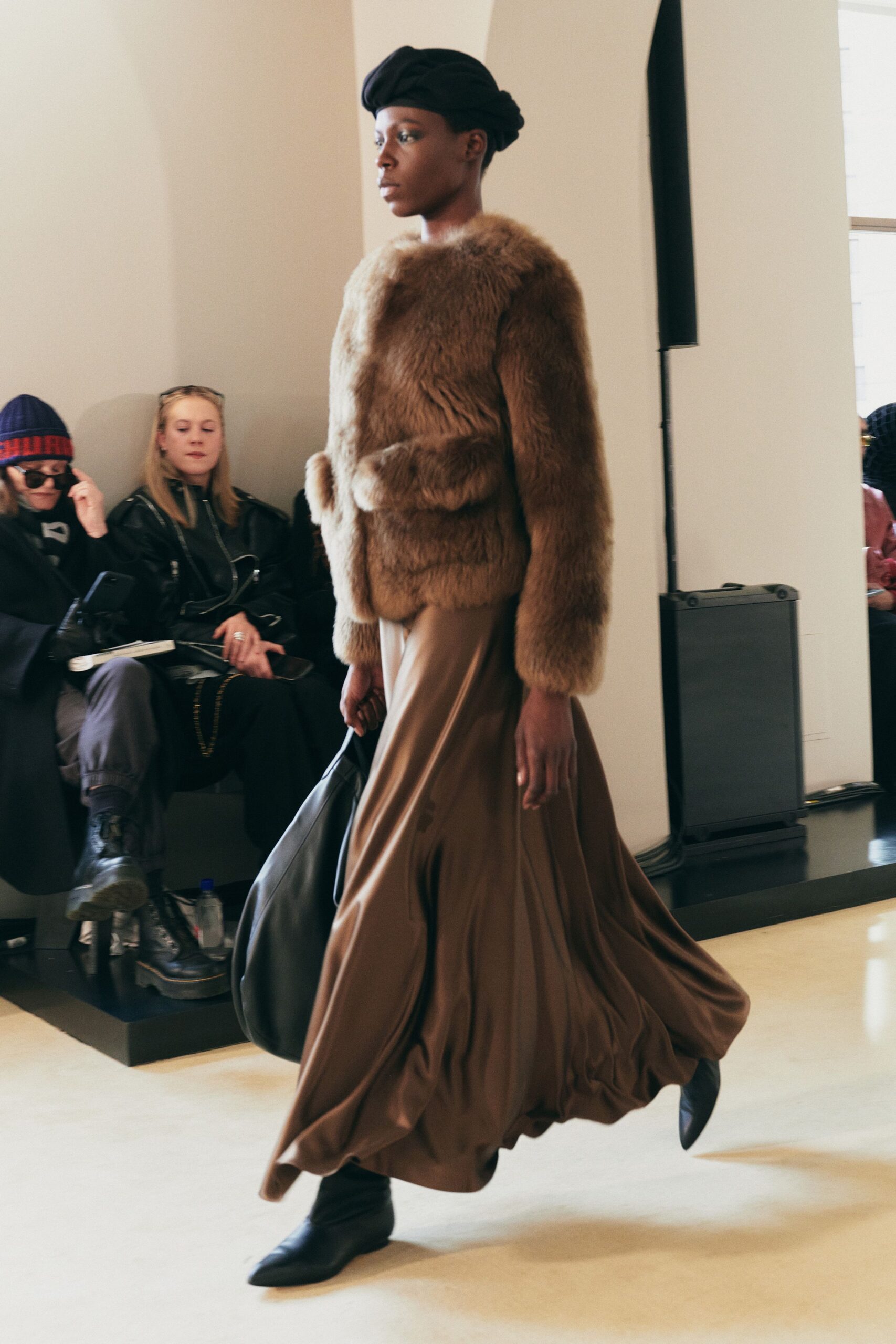 brown fur coat and maxi skirt