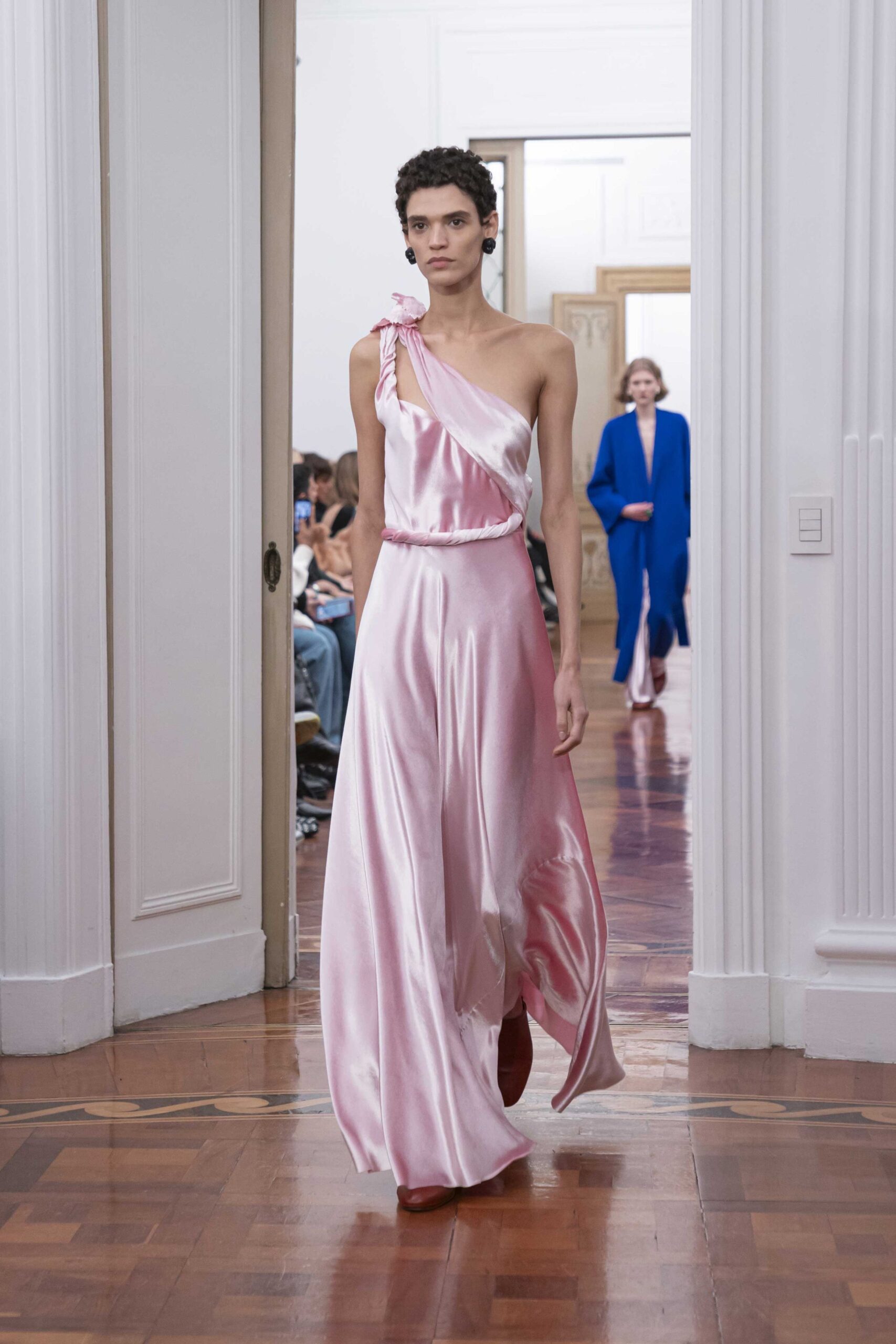 pink silk sleeveless off-shoulder fitted draped flowing gown