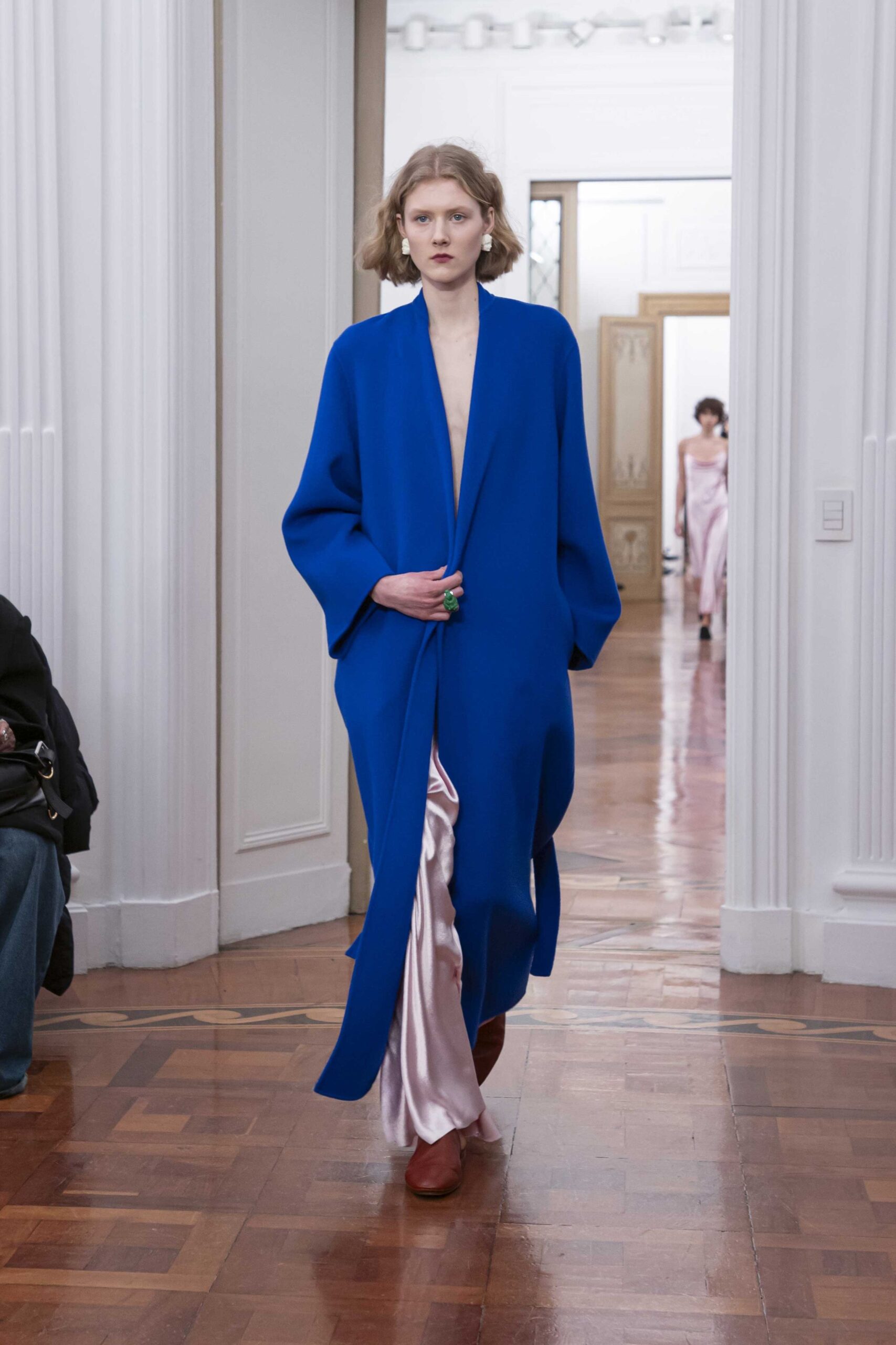 blue coat pink dress brown shoes