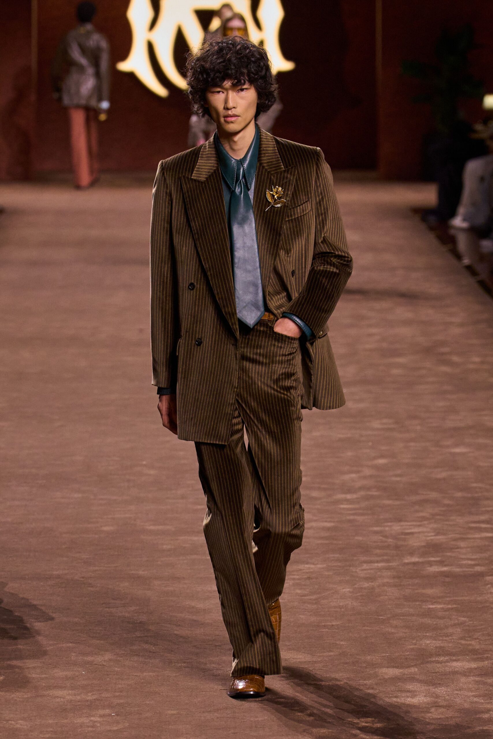 brown striped tailored suit