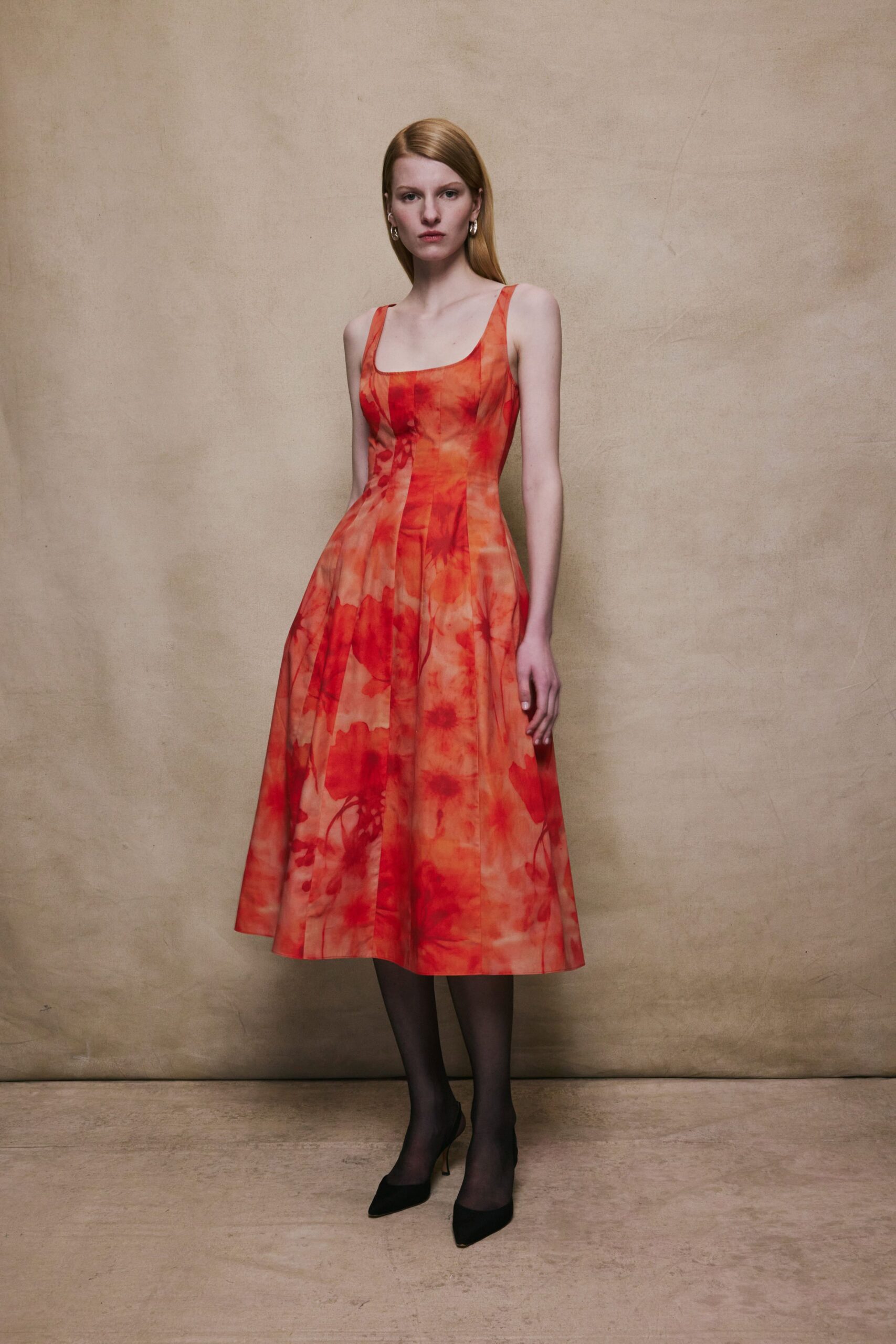 red orange pleated midi dress with heels