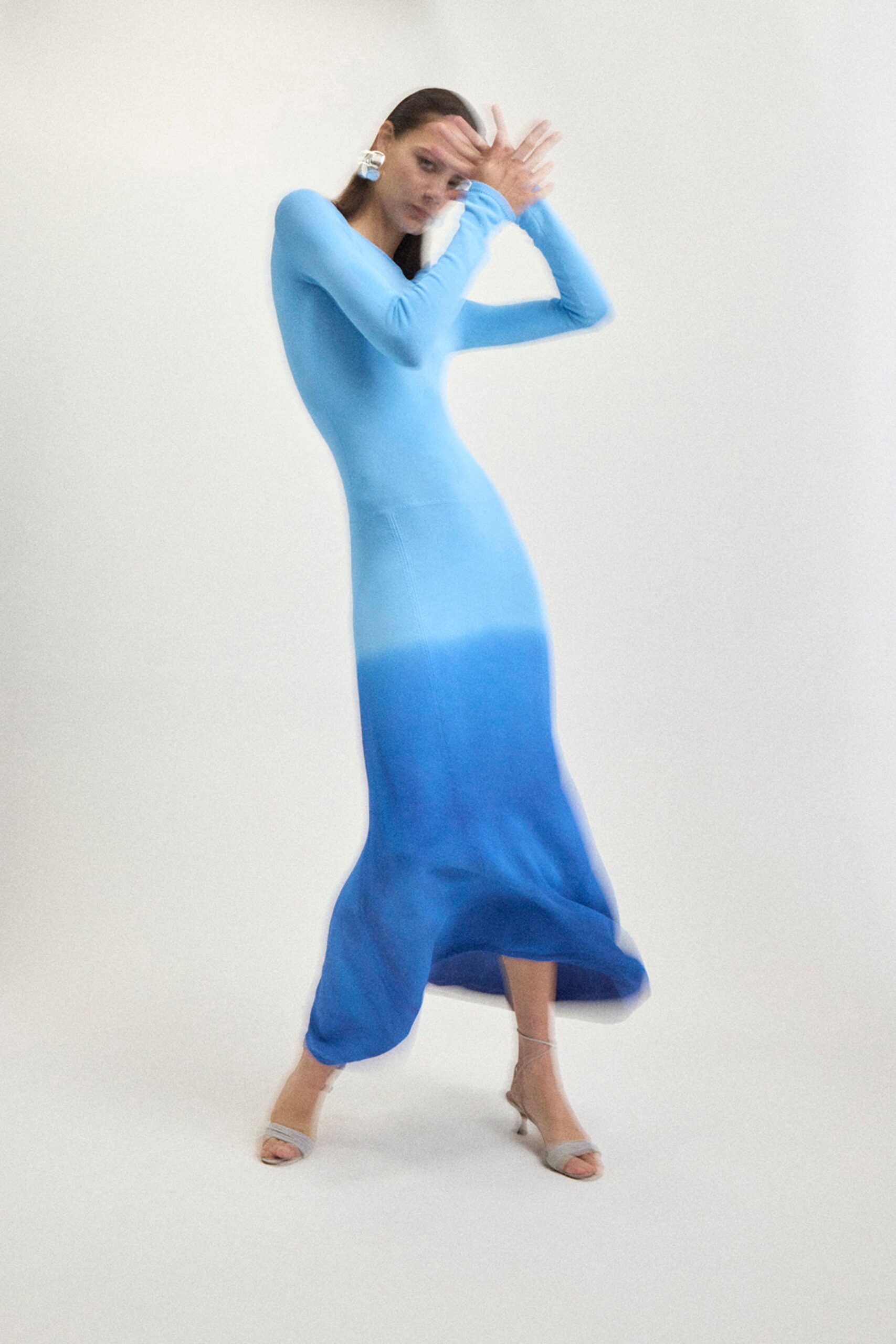 blue jersey long-sleeve v-neck fitted flowing midi dress