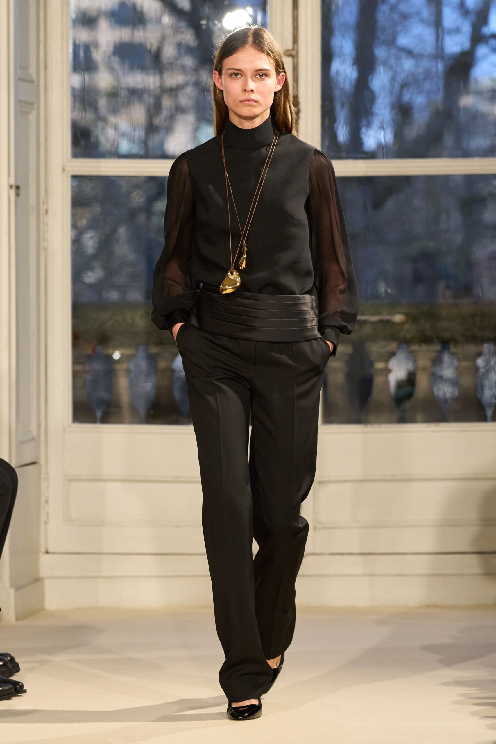 black silk fitted top and tailored pants