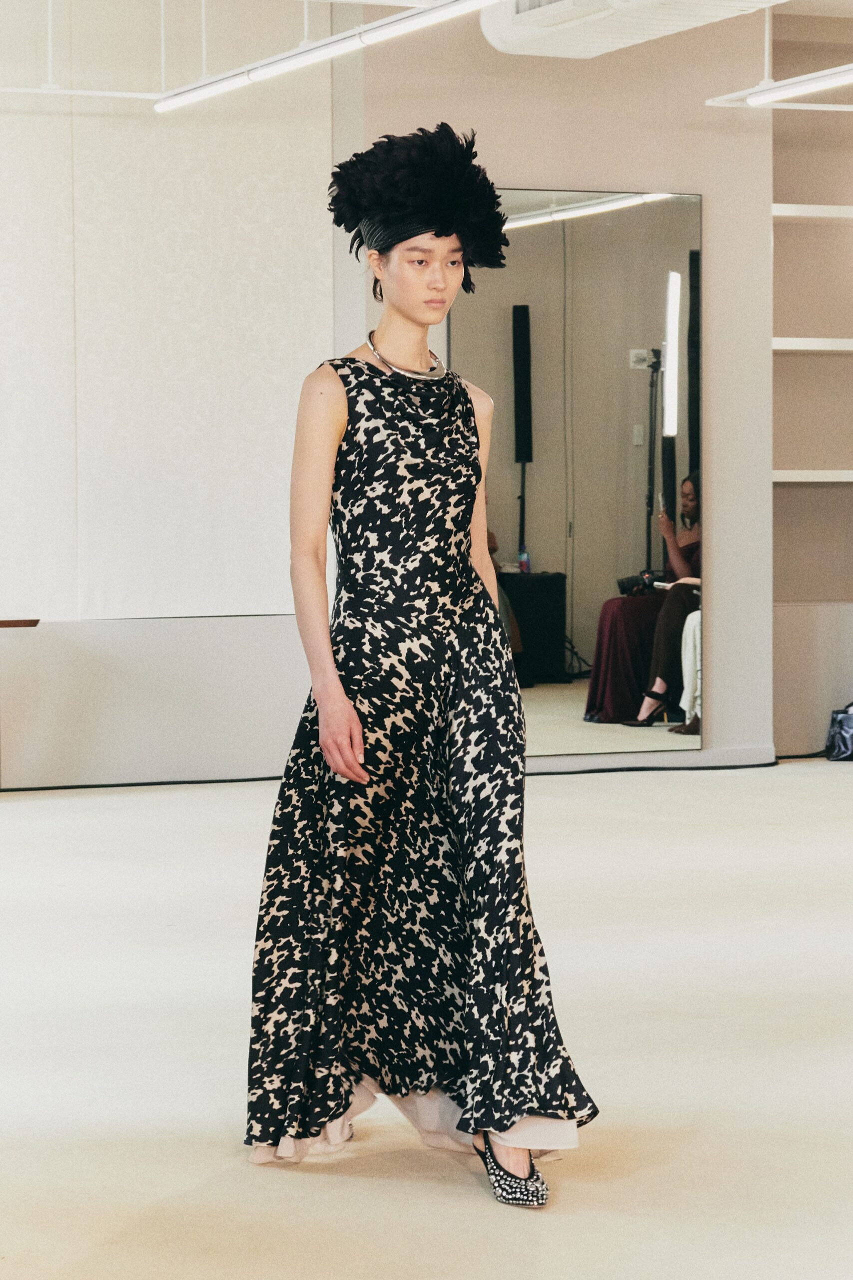 black silk sleeveless high-neck fitted flared printed gown