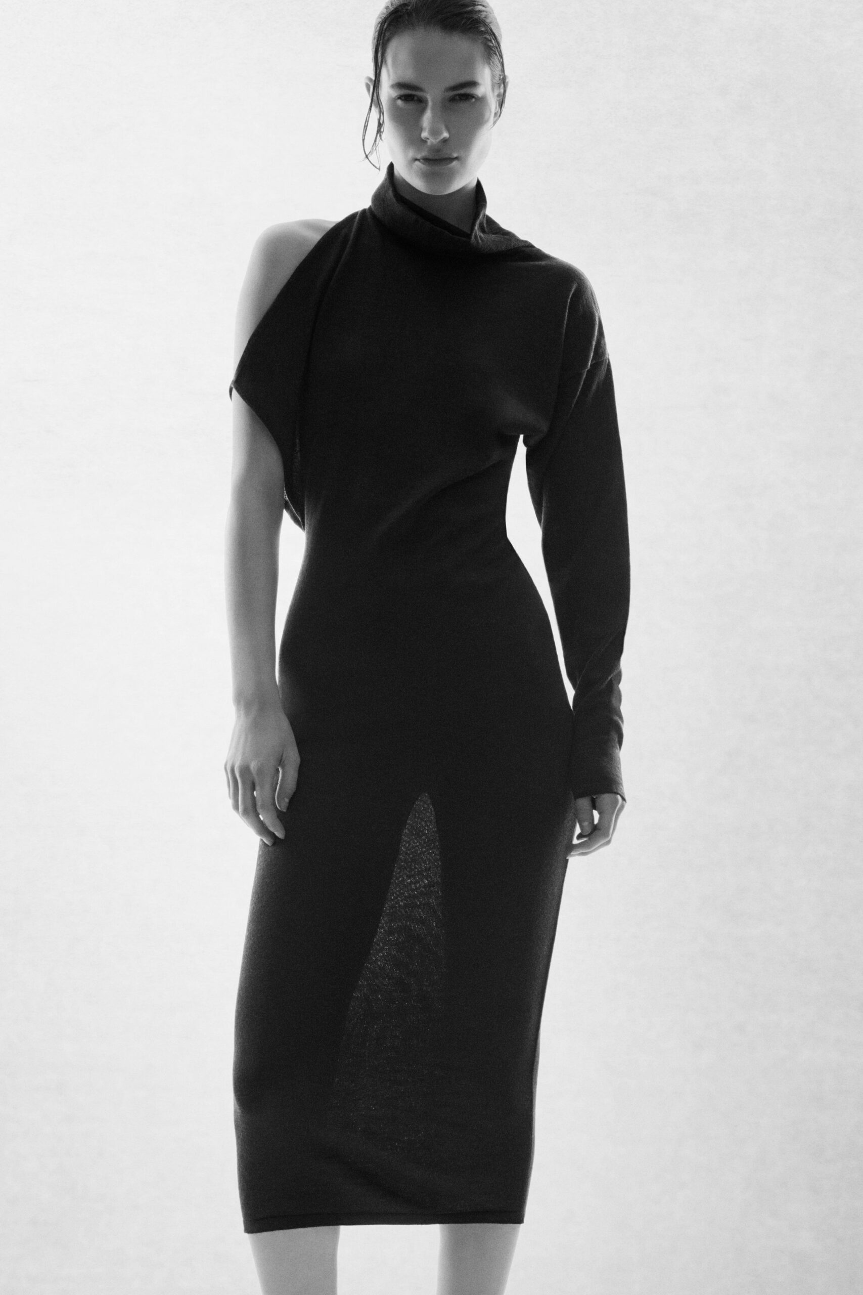 black fitted midi dress