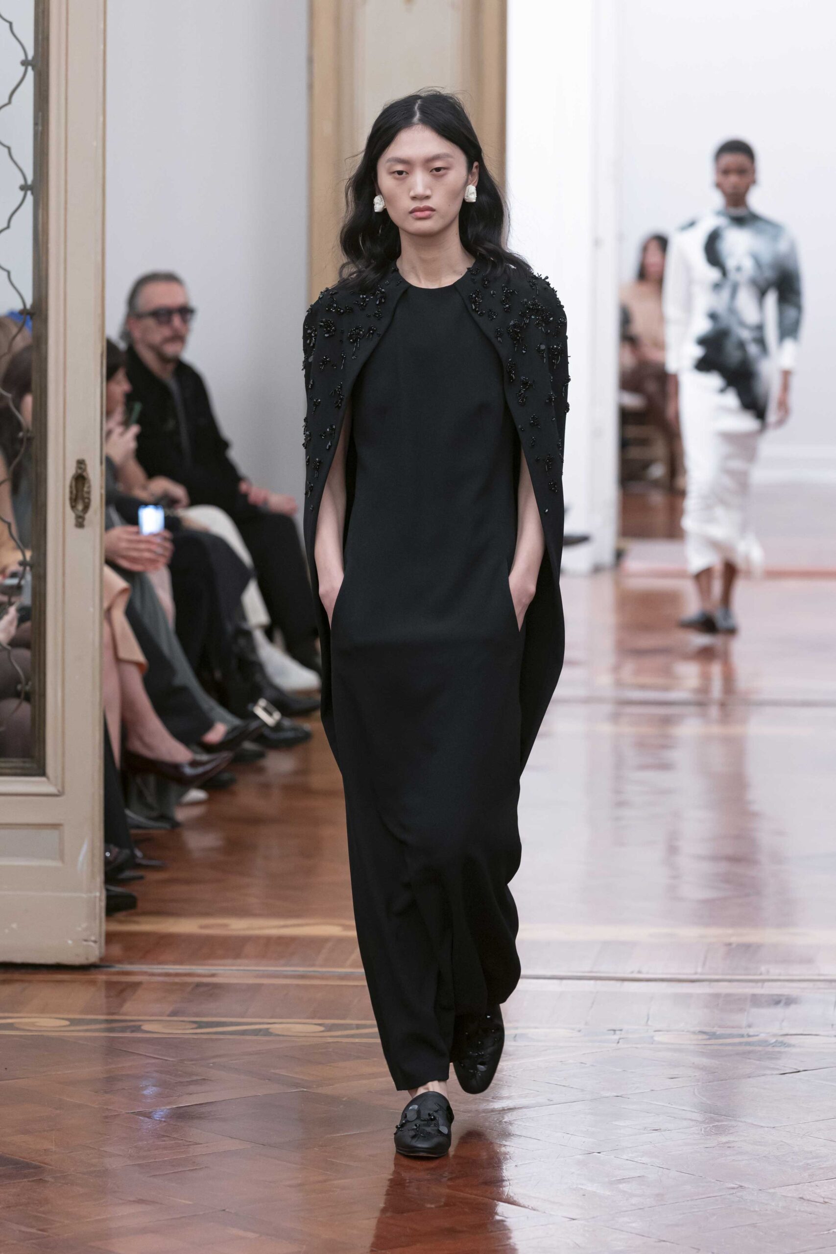 black silk gown with cape