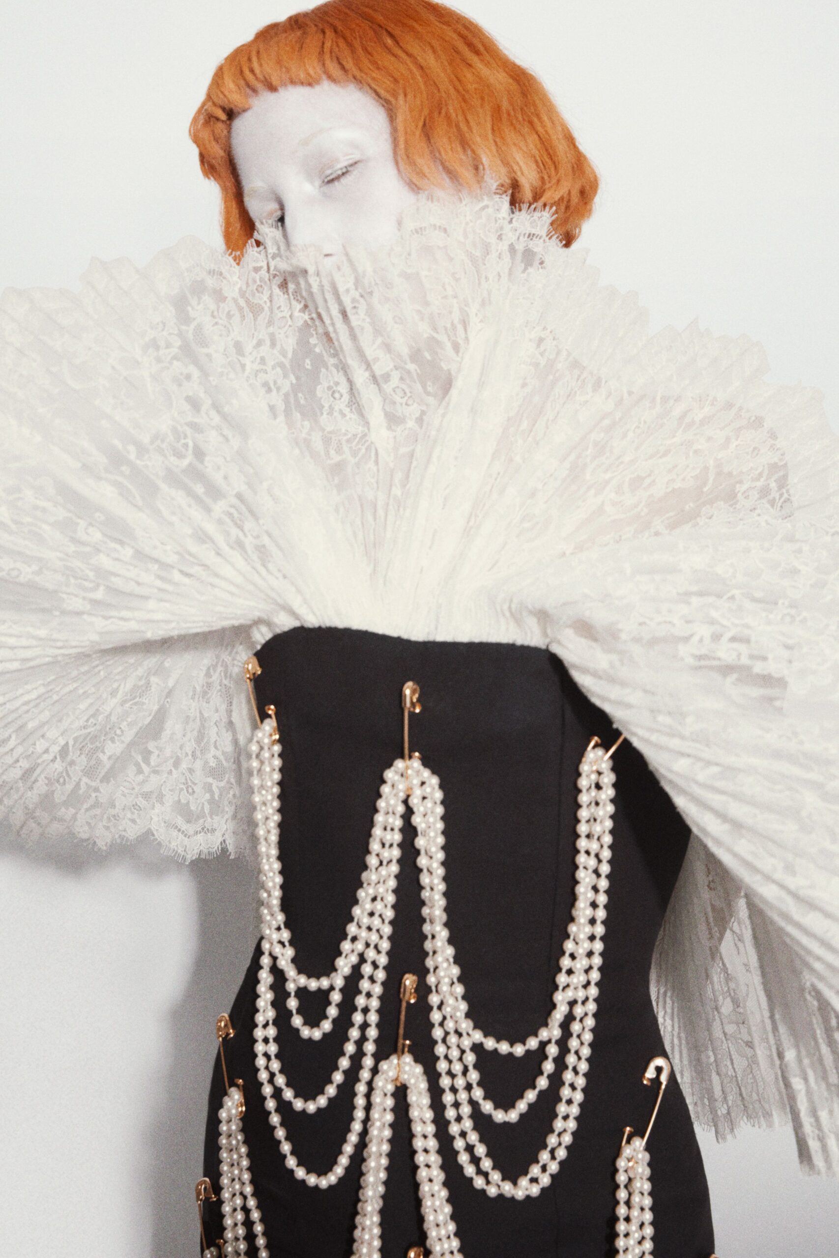 white lace sleeveless oversized layered flowing cape