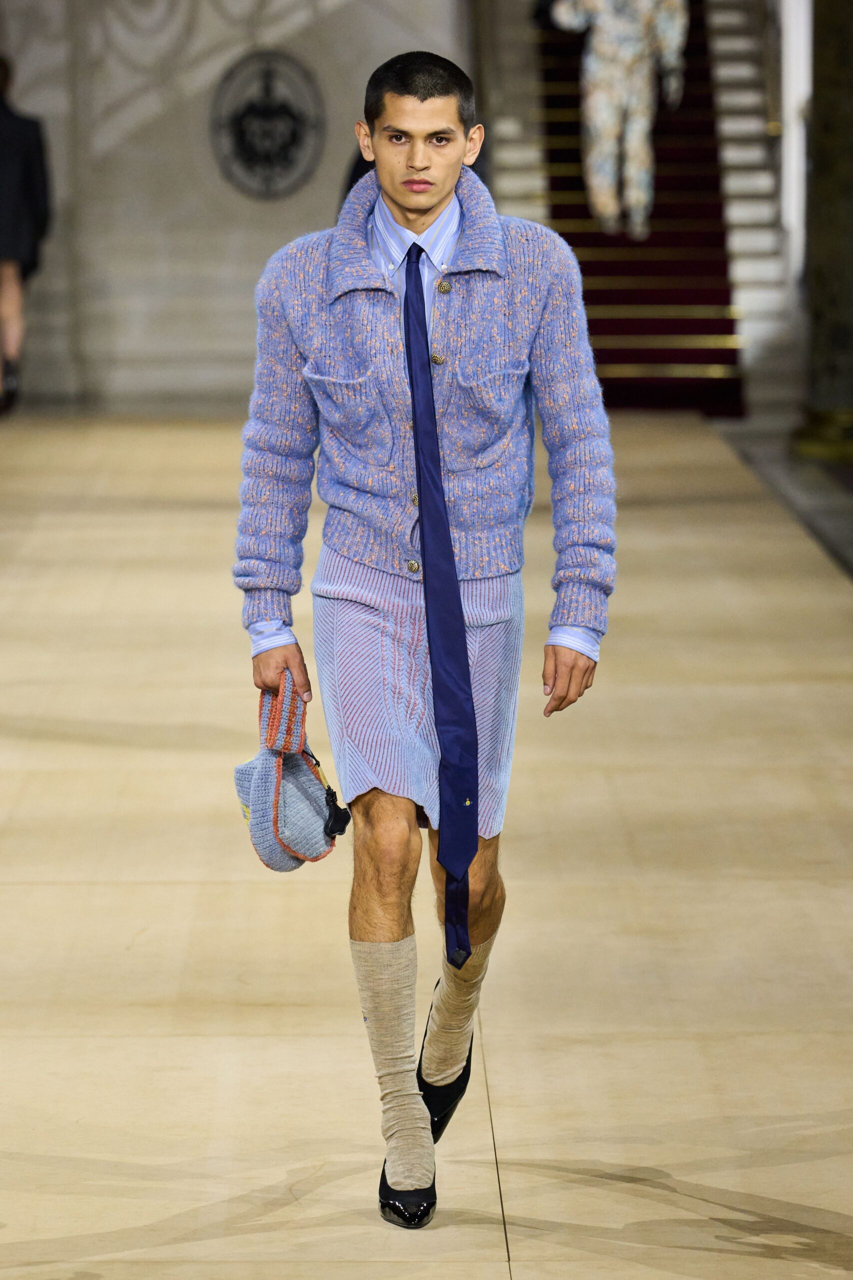 blue fitted sweater with mini skirt