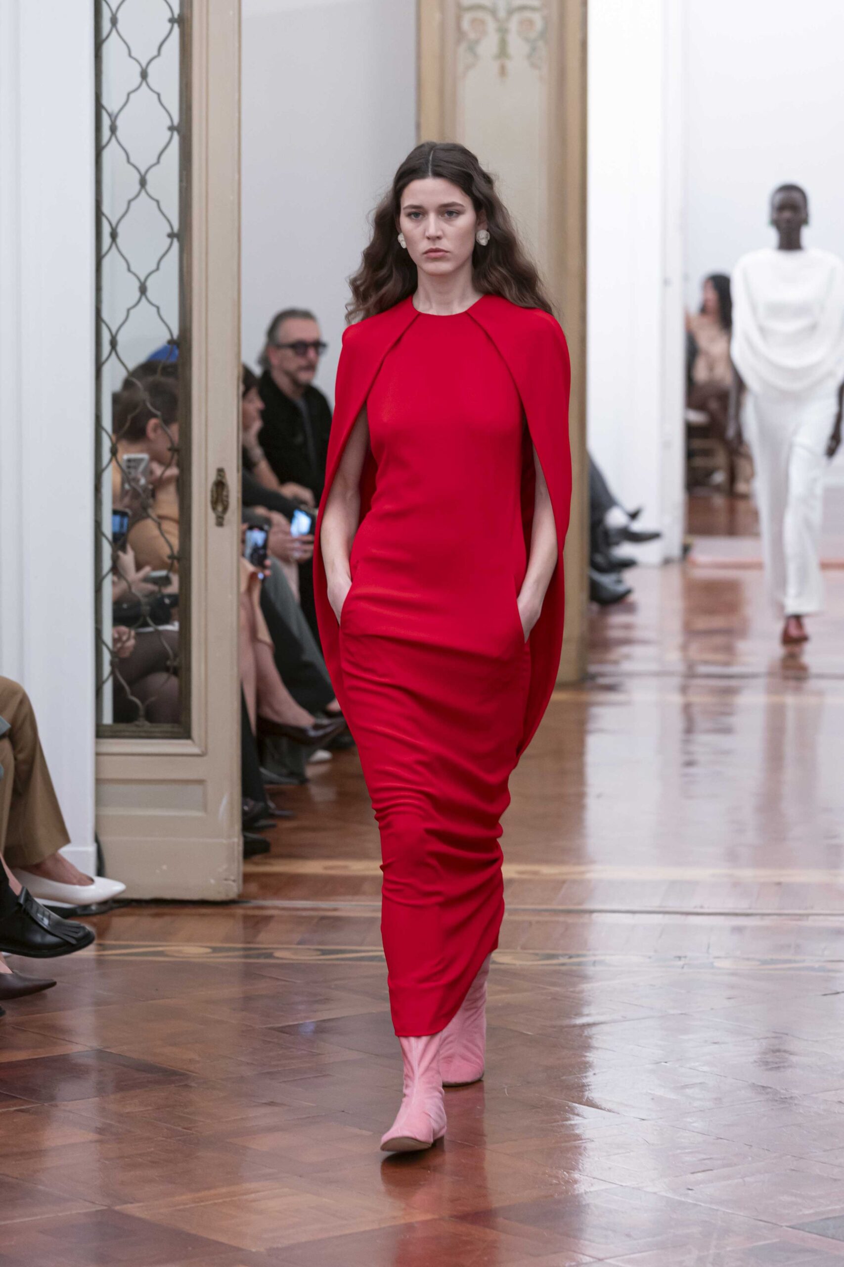 red silk fitted gown with pink boots