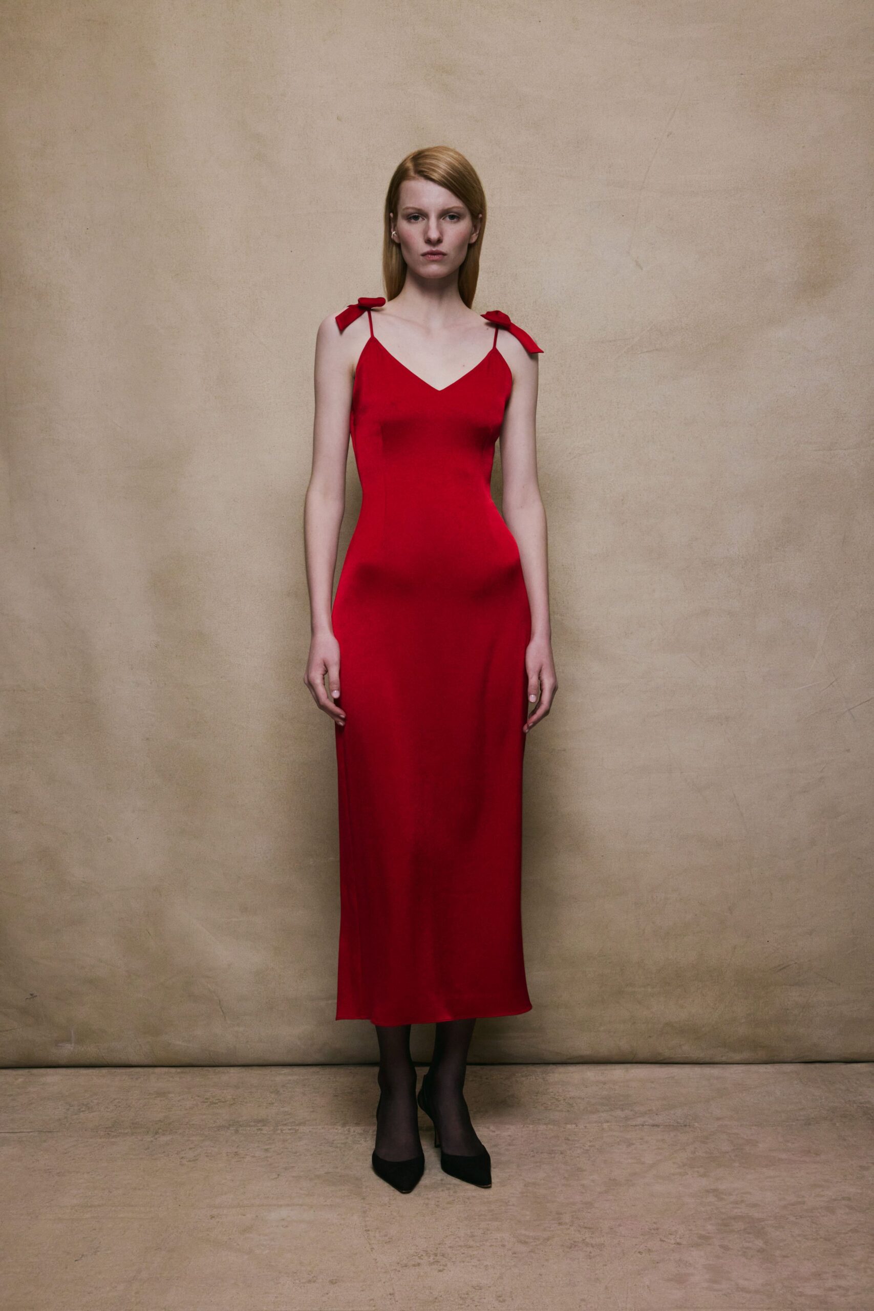 red silk midi dress with black shoes
