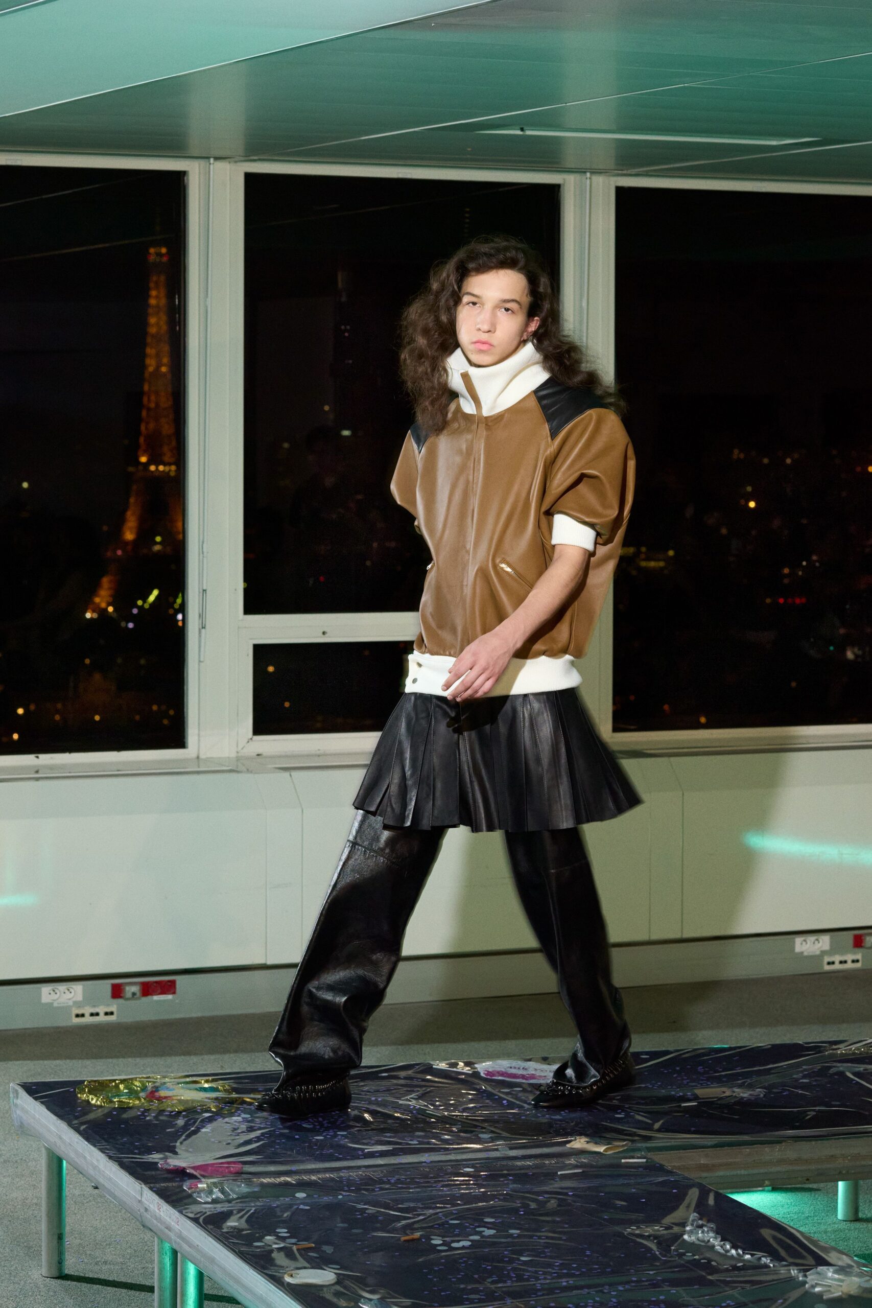 brown leather jacket with black skirt