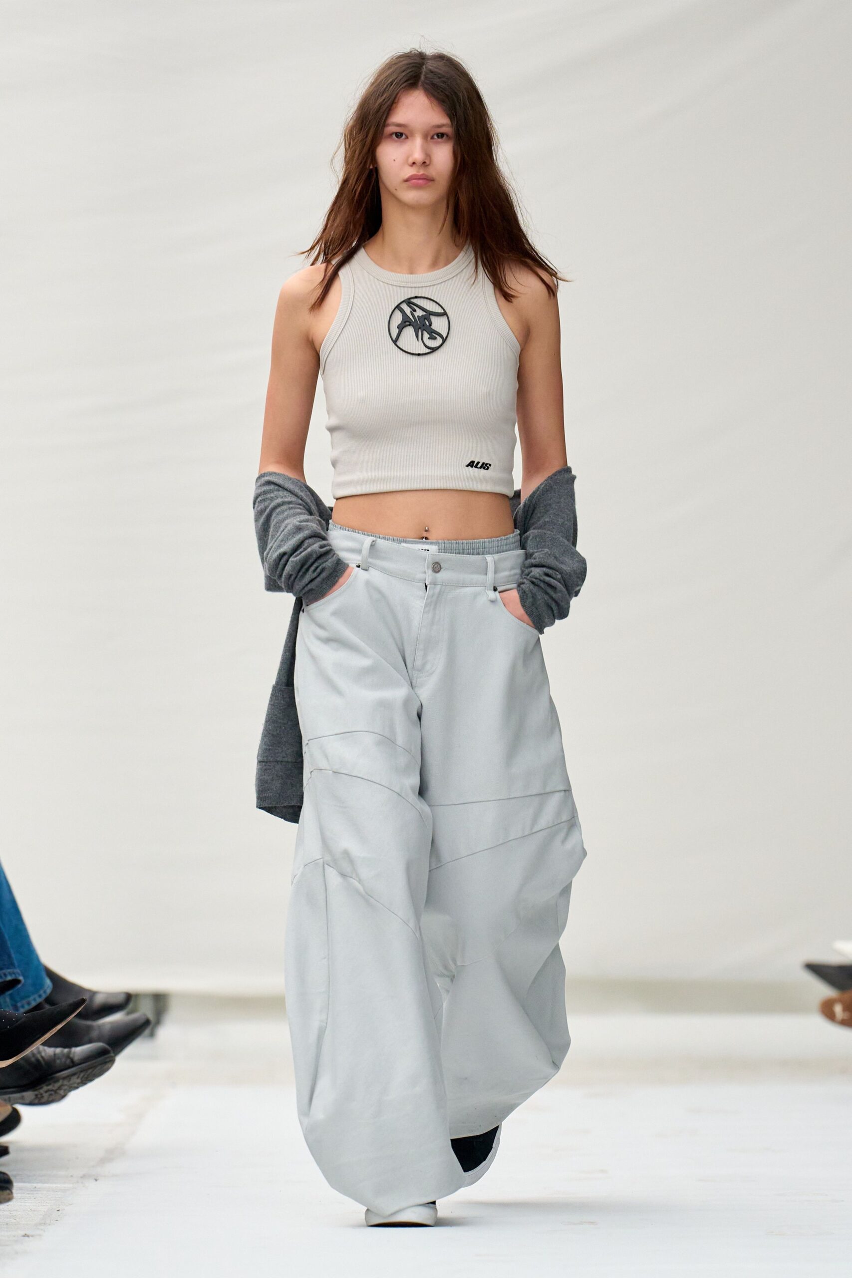 white tank-top gray pants cardigan