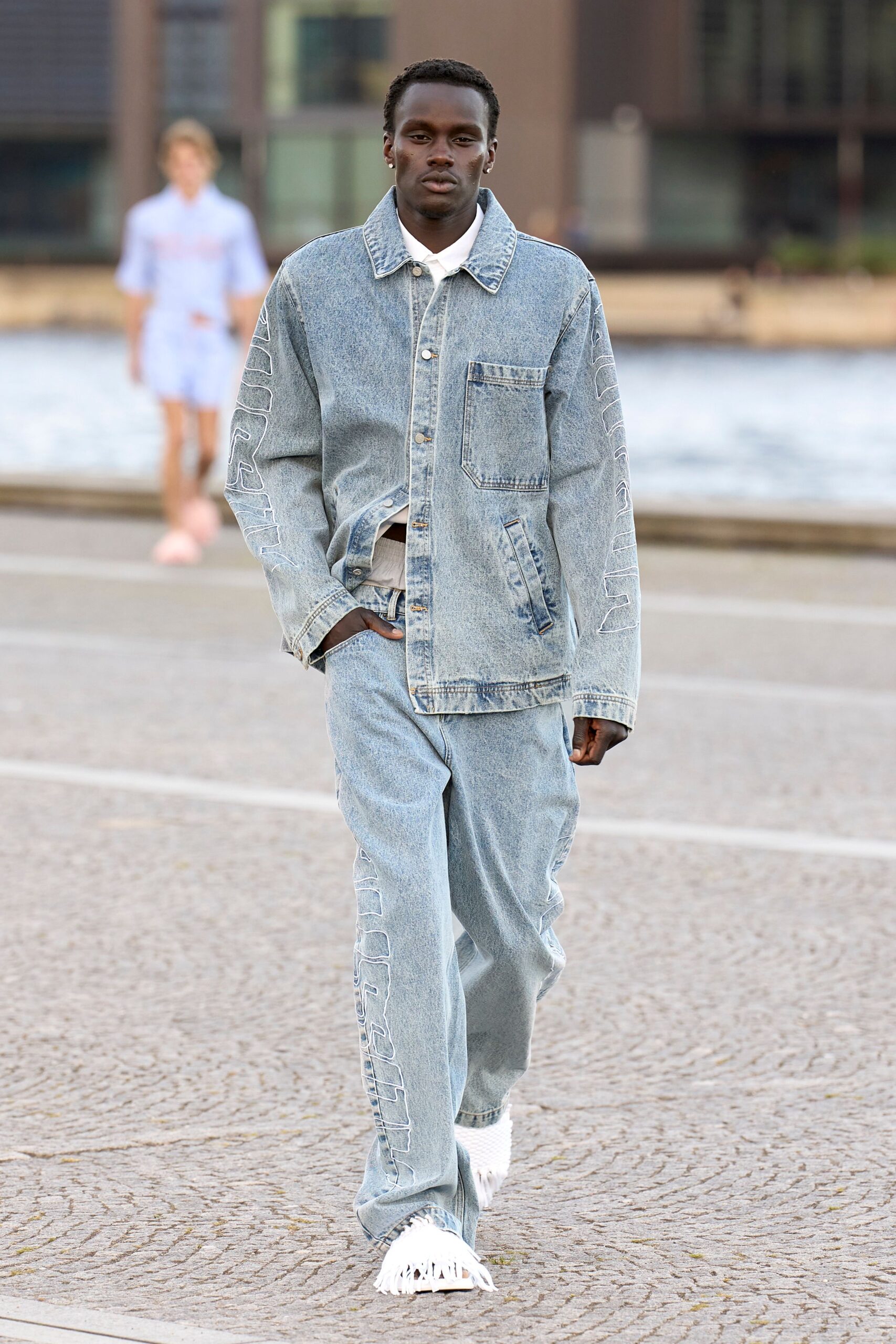 blue denim long-sleeve collared oversized buttoned pockets jacket