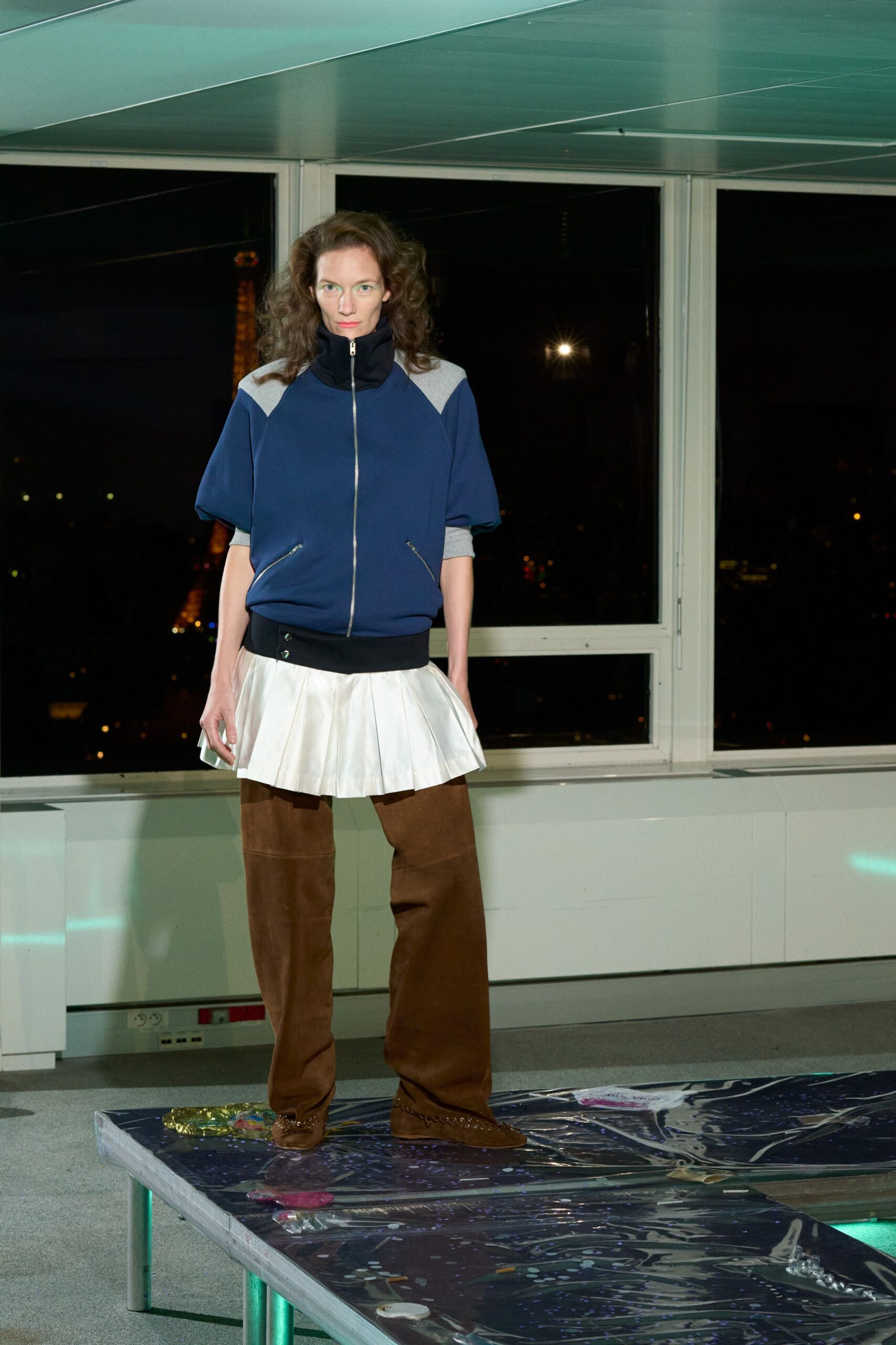 blue relaxed jacket with white pleated skirt