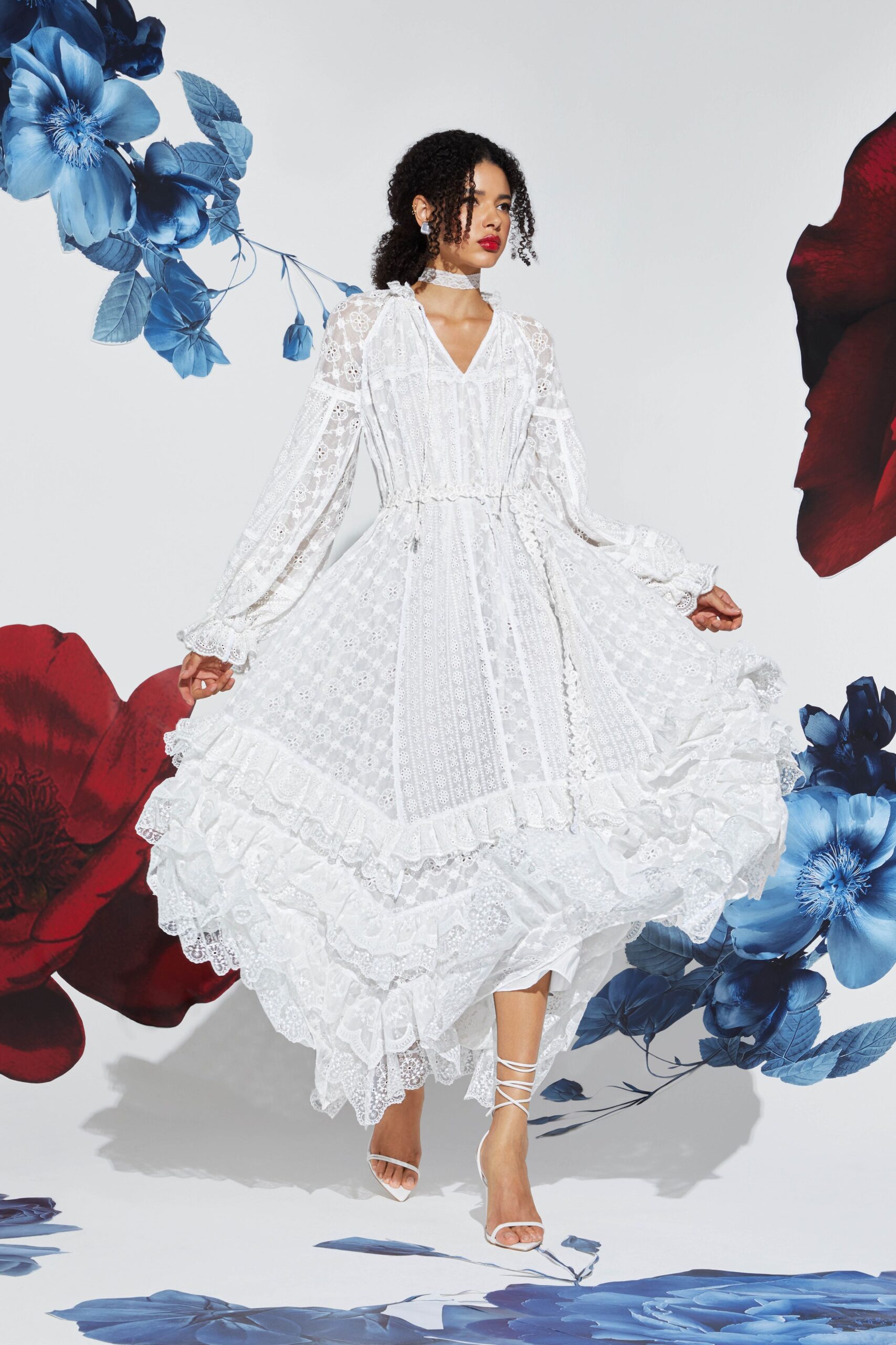 white lace midi dress with strappy shoes