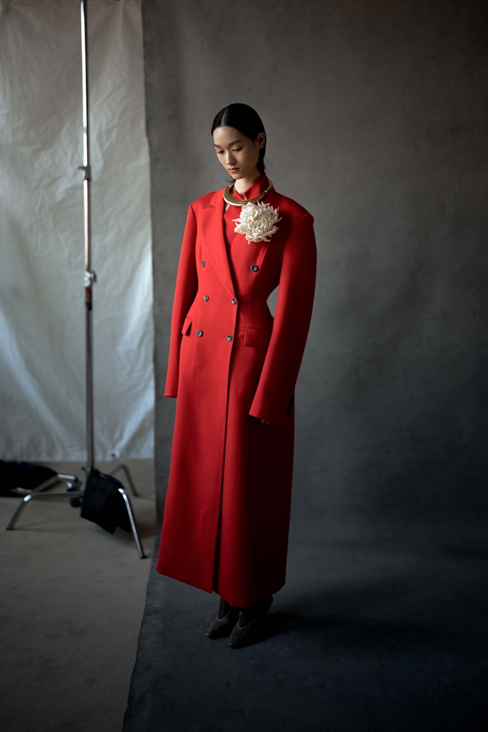 fitted red coat with black shoes