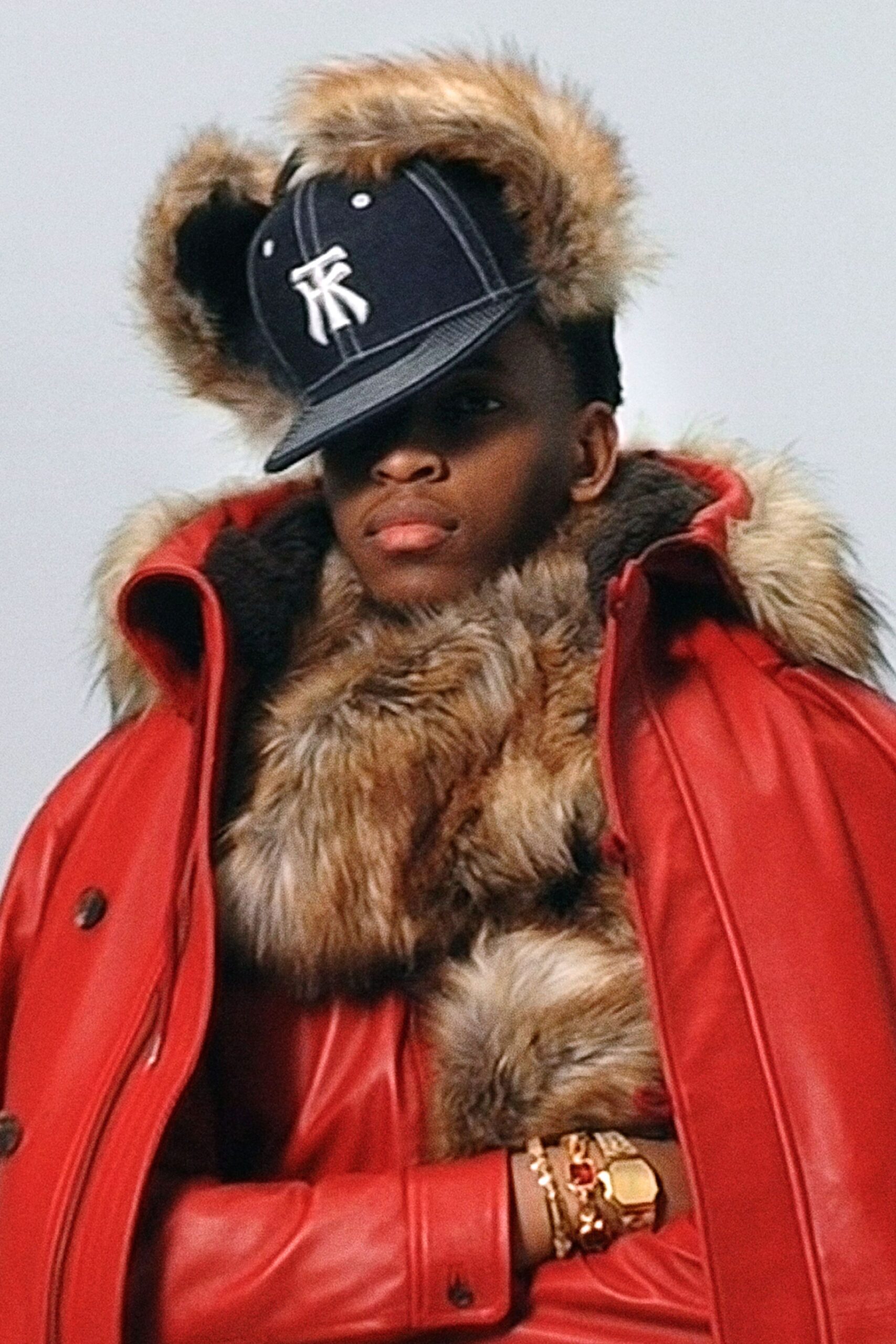 red leather long-sleeve collared fitted layered coat