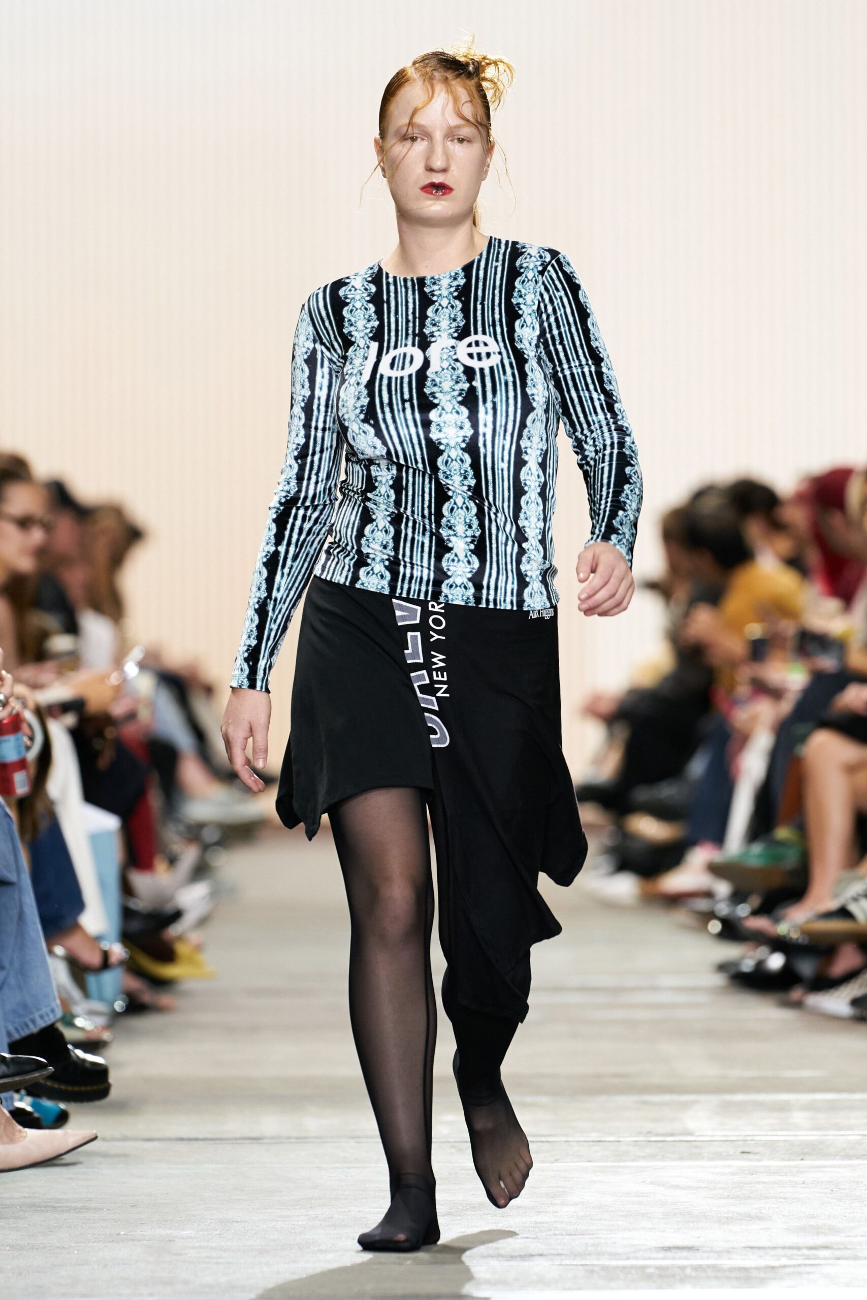 black and blue fitted top with asymmetric skirt