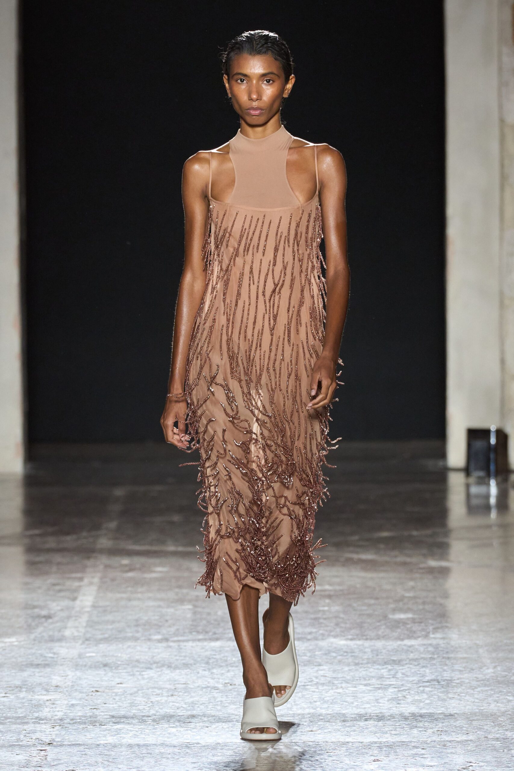 beige fringed midi dress with white shoes
