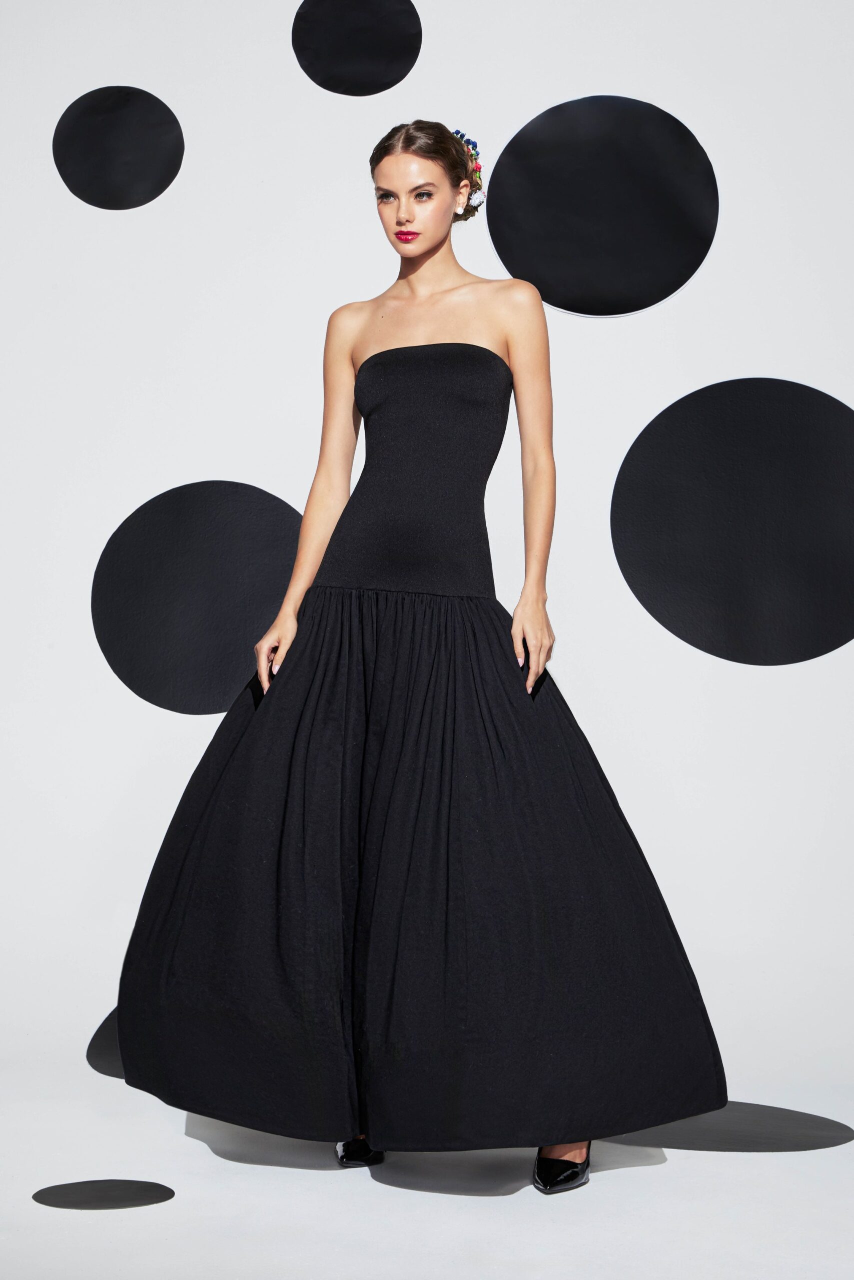 black strapless pleated gown