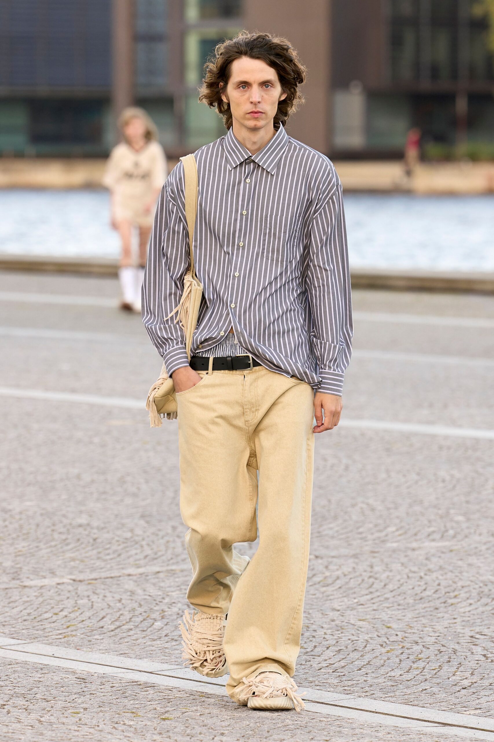 striped shirt with beige pants