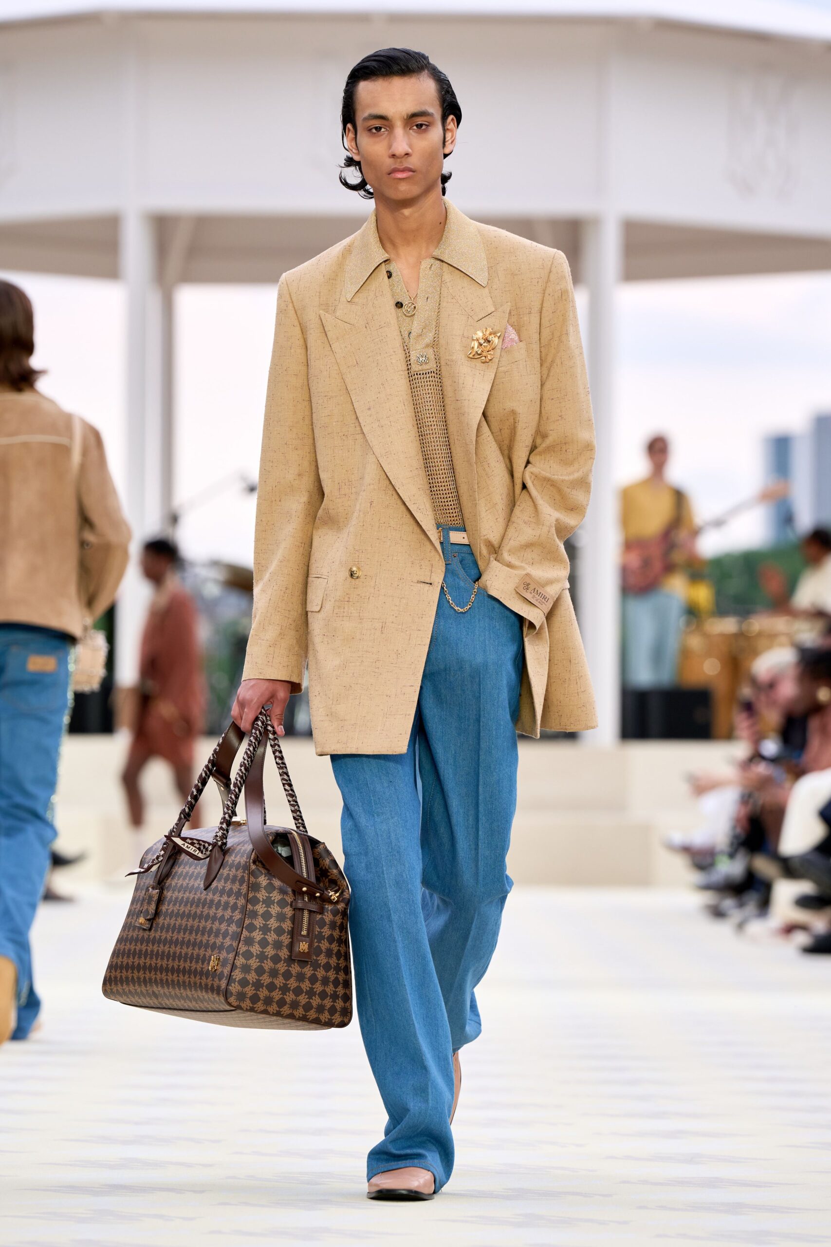 beige tailored blazer with denim pants