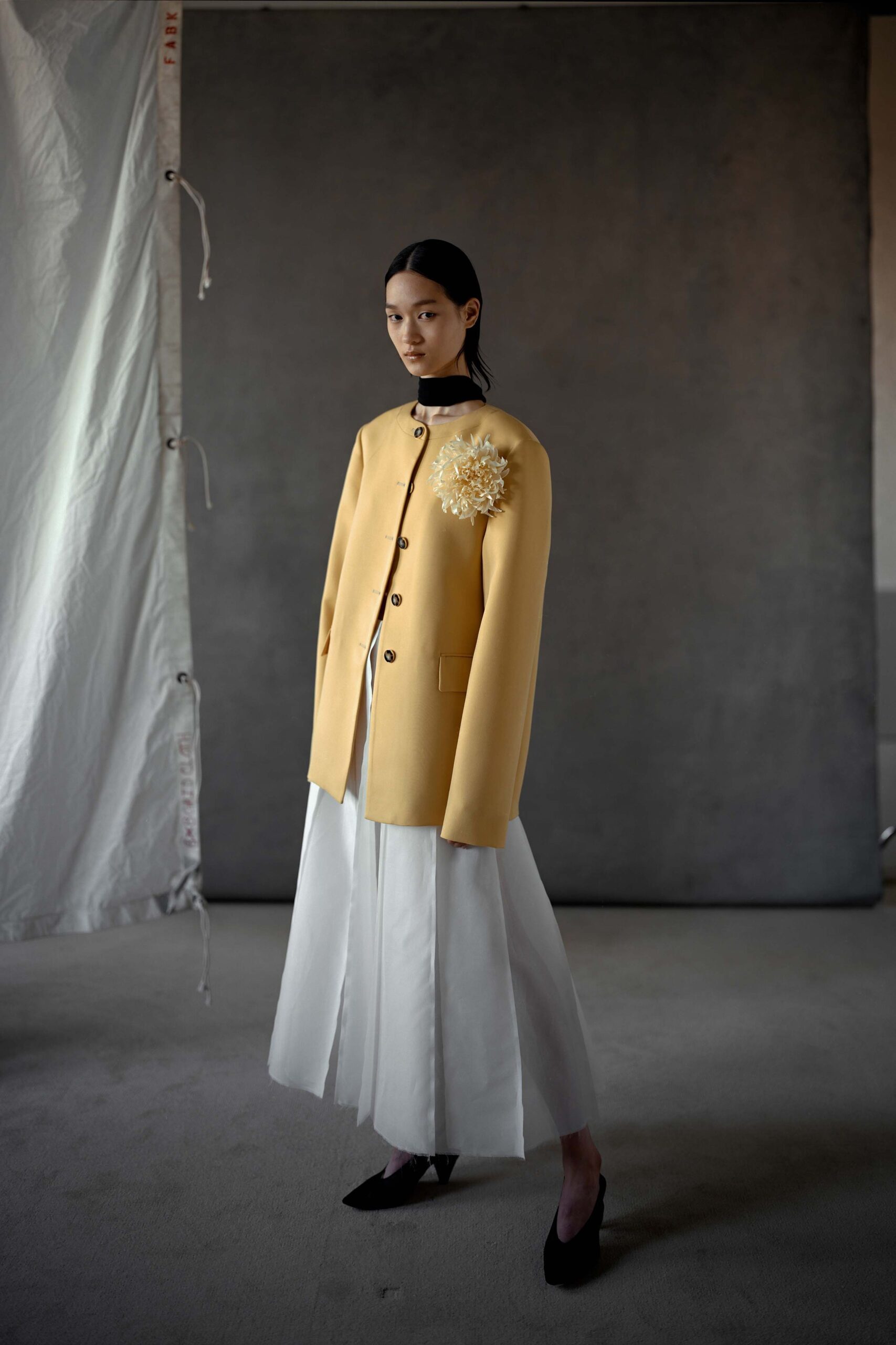 yellow wool coat with embroidered detail