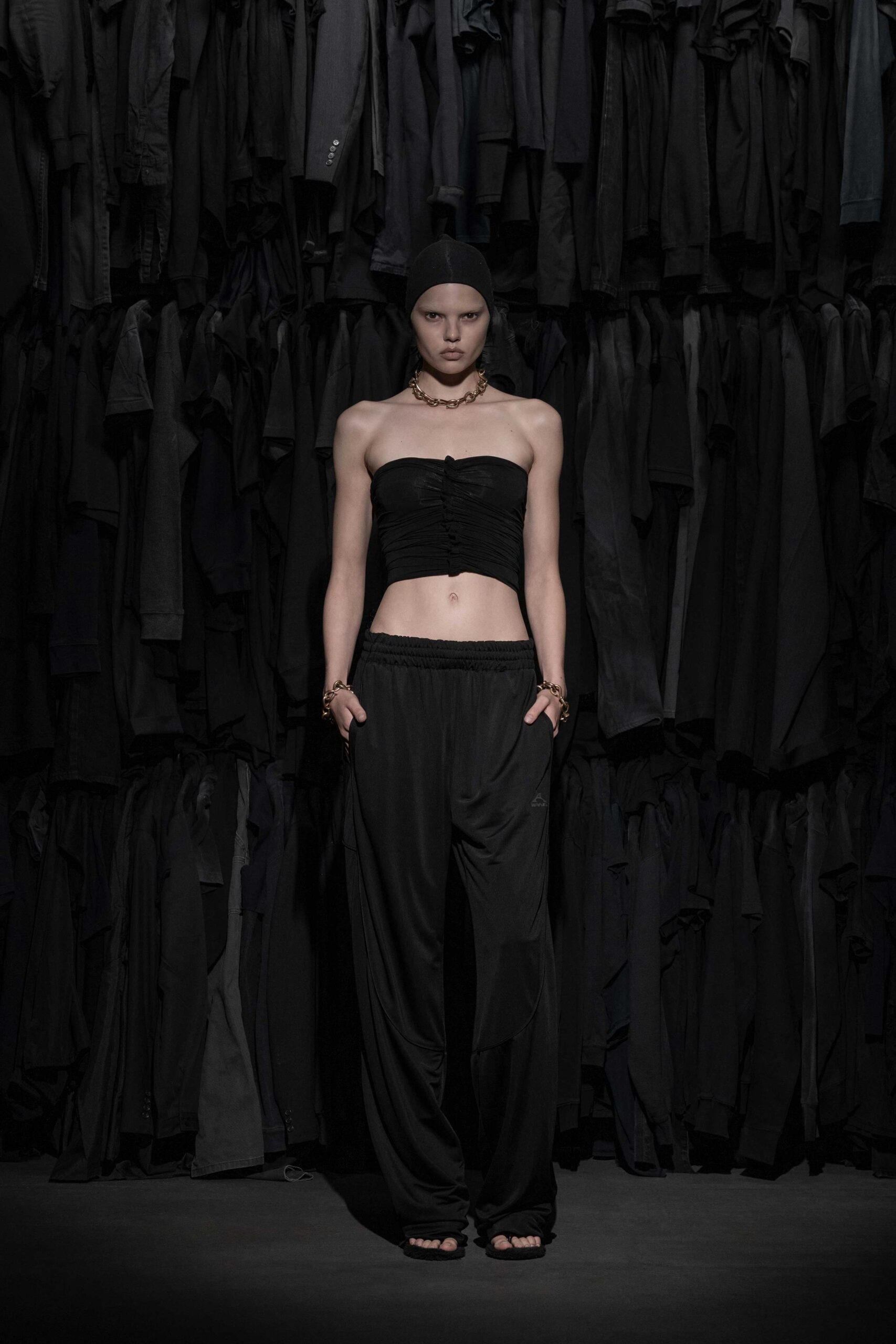 black fitted top and relaxed pants