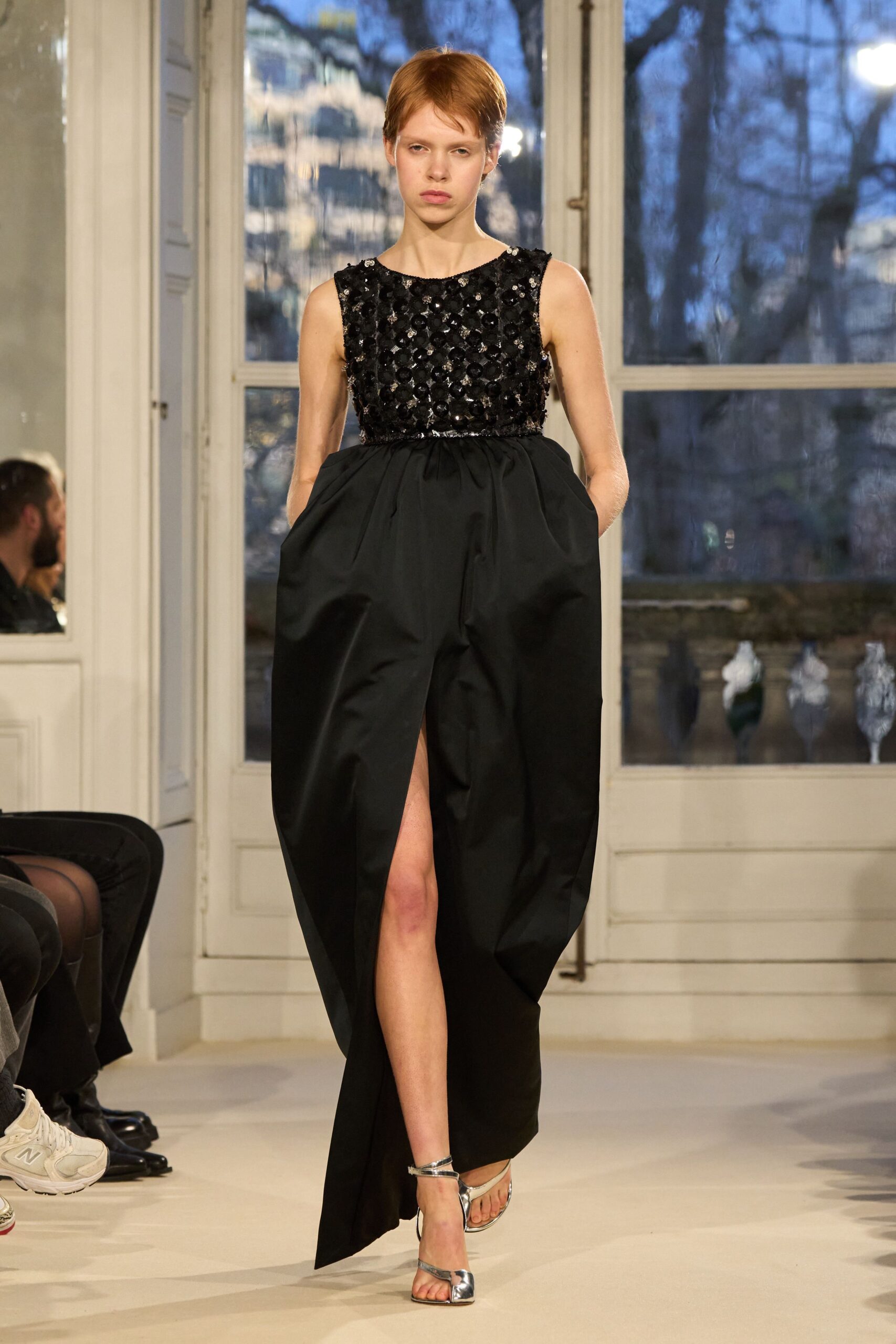 black silk sleeveless gown with slit