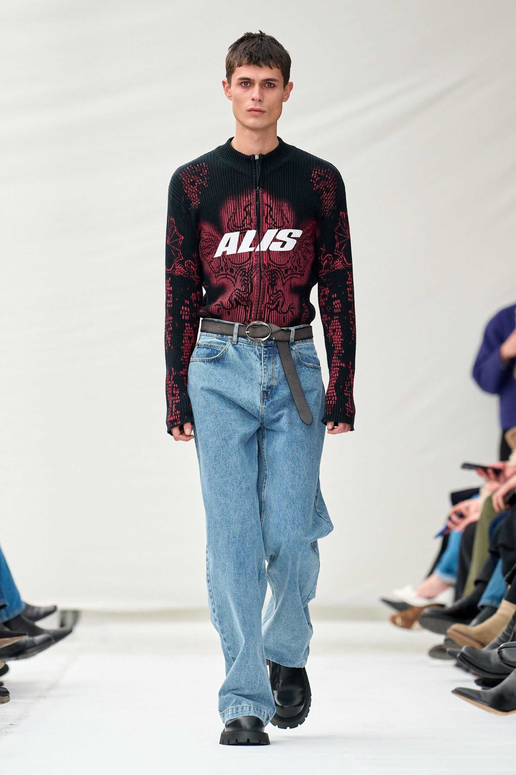 black red printed sweater with jeans
