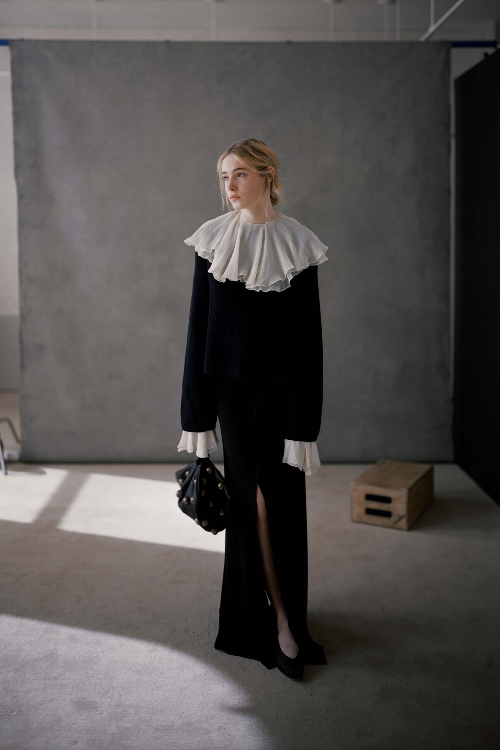 black and white ruffled top with midi skirt
