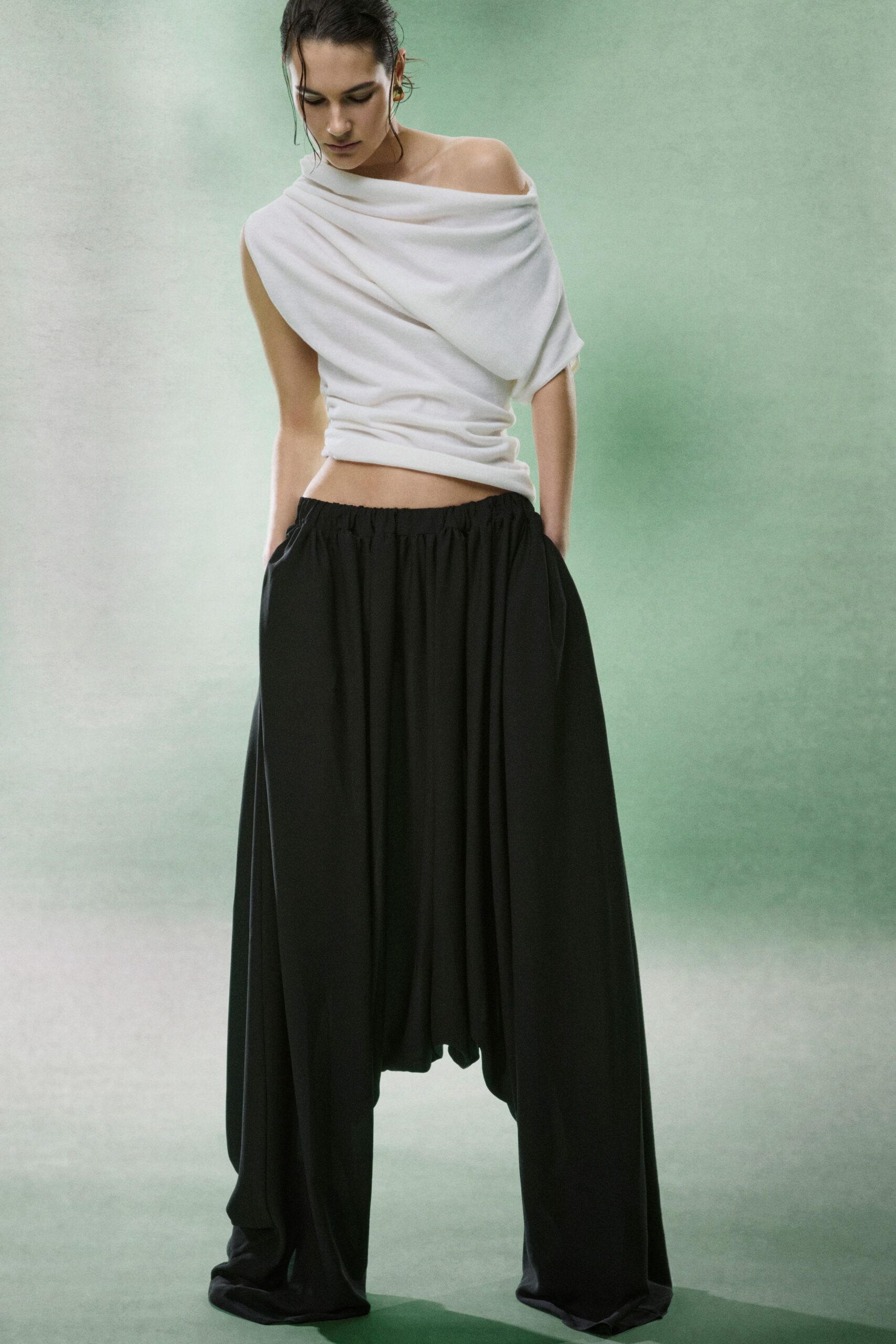 white relaxed top and black wide-leg pants