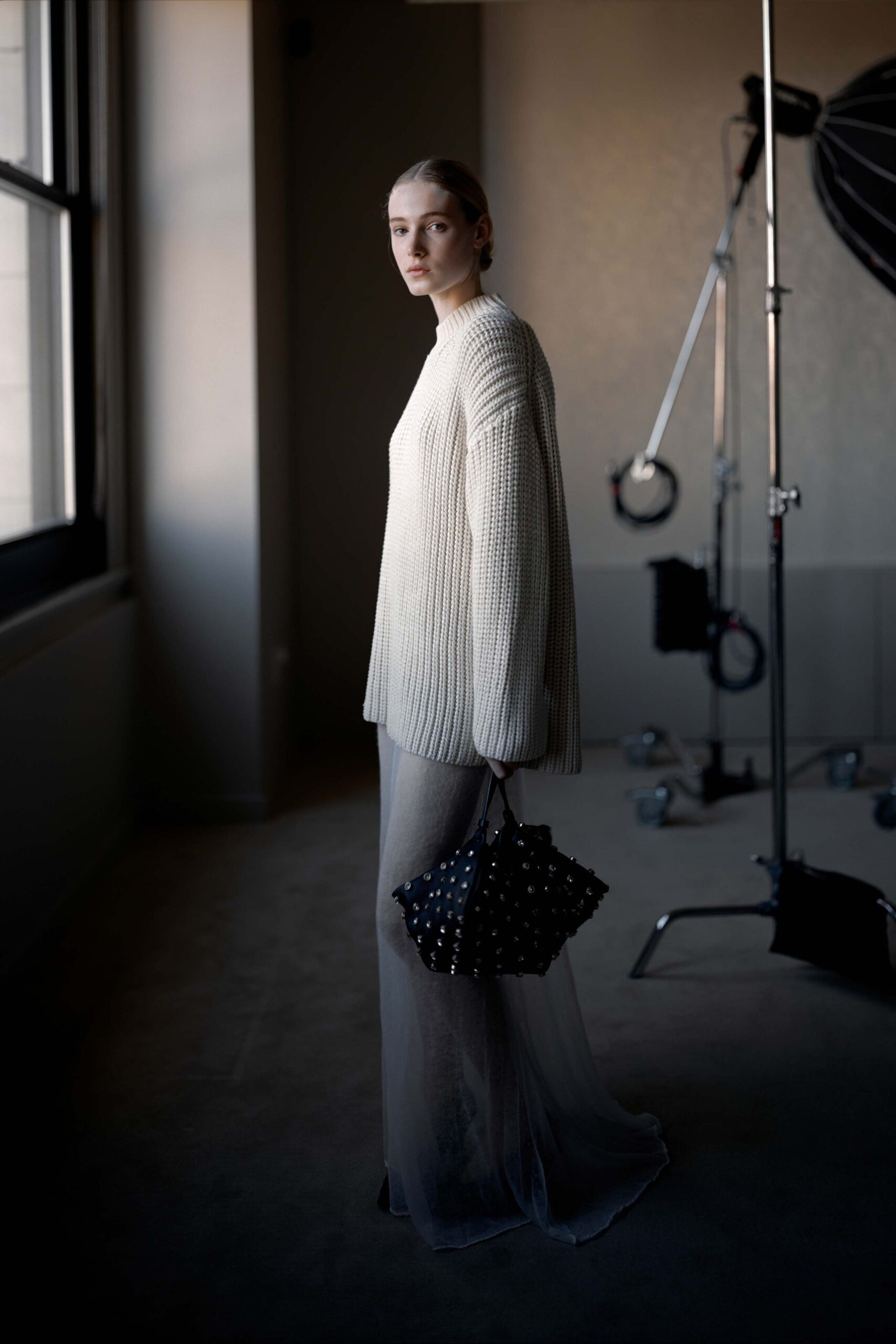 white relaxed sweater gray sheer skirt