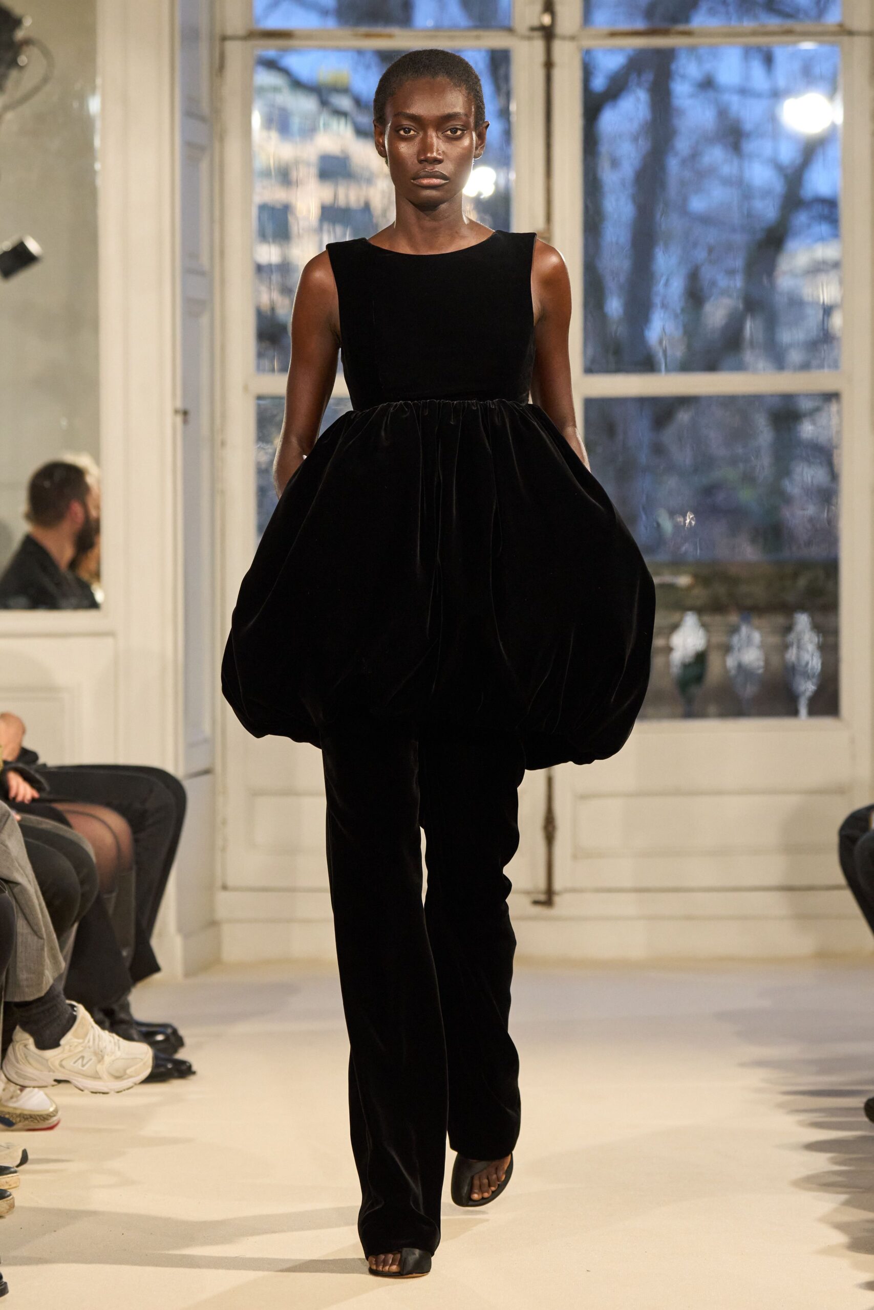 black velvet sleeveless high-neck fitted pleated midi dress